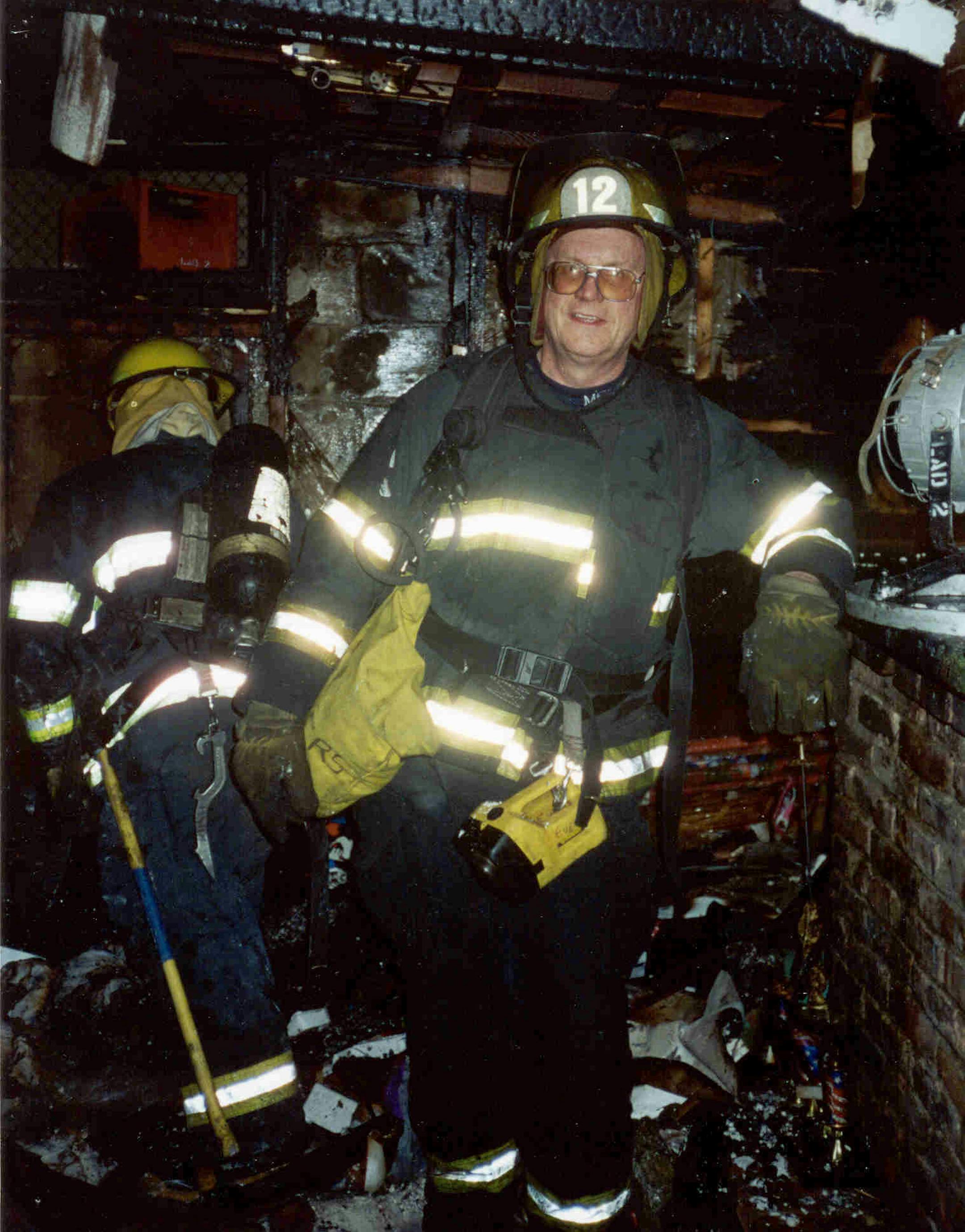Guy Evers working his last fire for the Minneapolis Fire Department in 1999. He was a firefighter for 25 years.