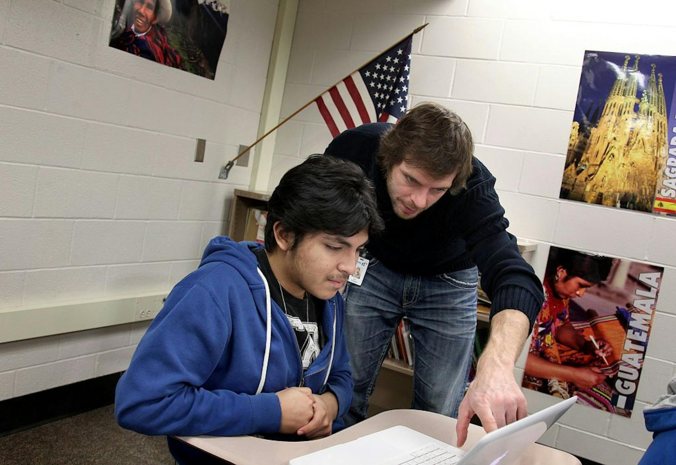 Juntos teacher Erik Thompson worked with student Rolando Orozco.