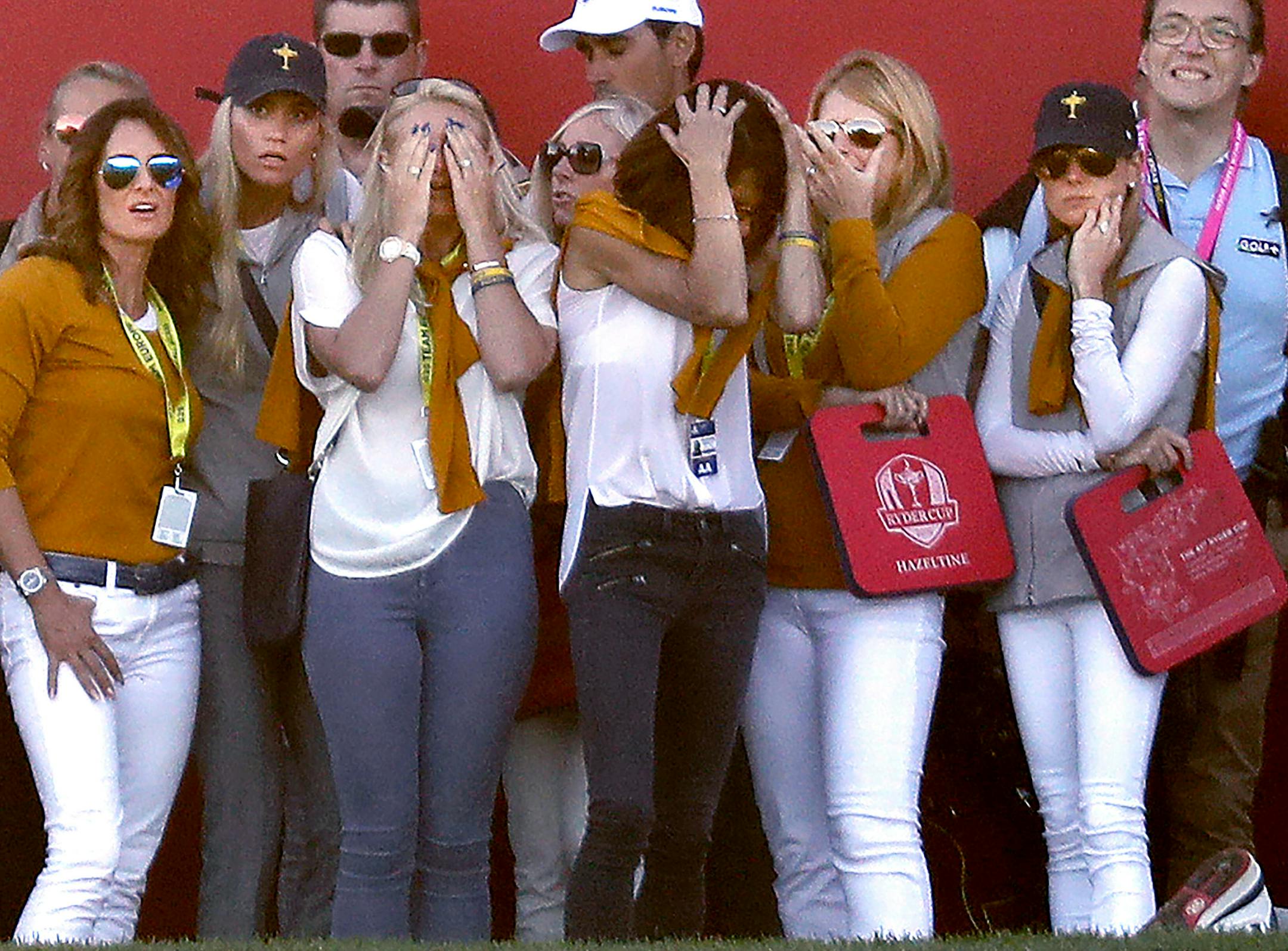 European team&#xed;s wives reacted after a missed putt by Lee Westwood on the on the 18th hole during the afternoon foursomes on Saturday. Danny Willett and Lee Westwood lost their match against J.B. Holmes and Ryan Moore. ] CARLOS GONZALEZ cgonzalez@startribune.com - October 1, 2016, Chaska, MN, Hazeltine National Golf Club, 2016 Ryder Cup