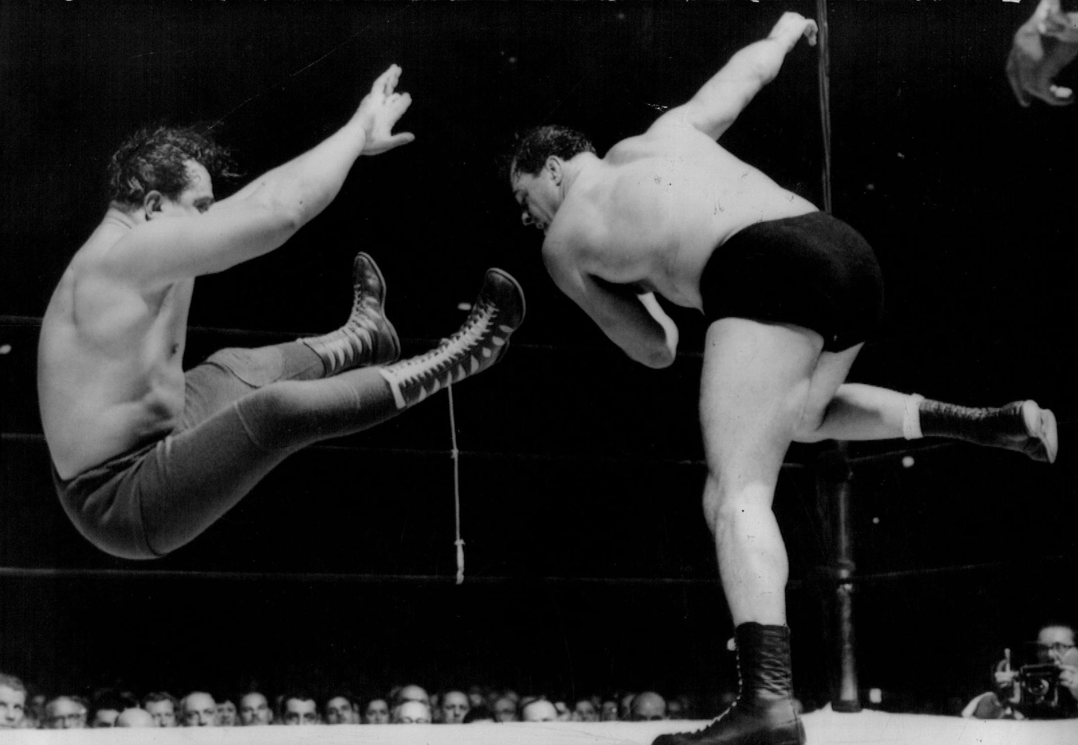October 29, 1953 "Lefty" Verne Gagne of Minnesota lets go with a high fast one - - note that follow through - - in the form of the Mighty Atlas from California who "floats through the air" like the proverbial man on the flying trapeze. Action took place during wrestling match at Madison Square Garden 10/ 27. Gagne pitched himself to victory in 13 minutes and 30 seconds in a match scheduled to last " to a finish. " November 22, 1953 Minneapolis Star Tribune; Minneapolis Sunday Tribune; United Pre