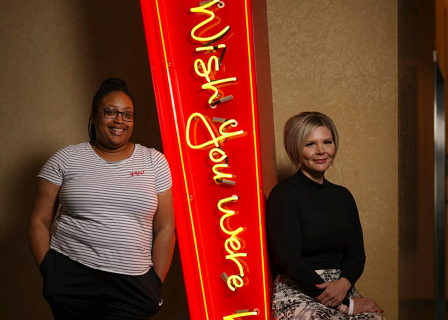 Nyreshia Davis, housekeeping manager, left, and Lindsey Lundgren, night front desk manager, in the lobby of the InterContinental Hotel at Minneapolis-St. Paul International Airport.