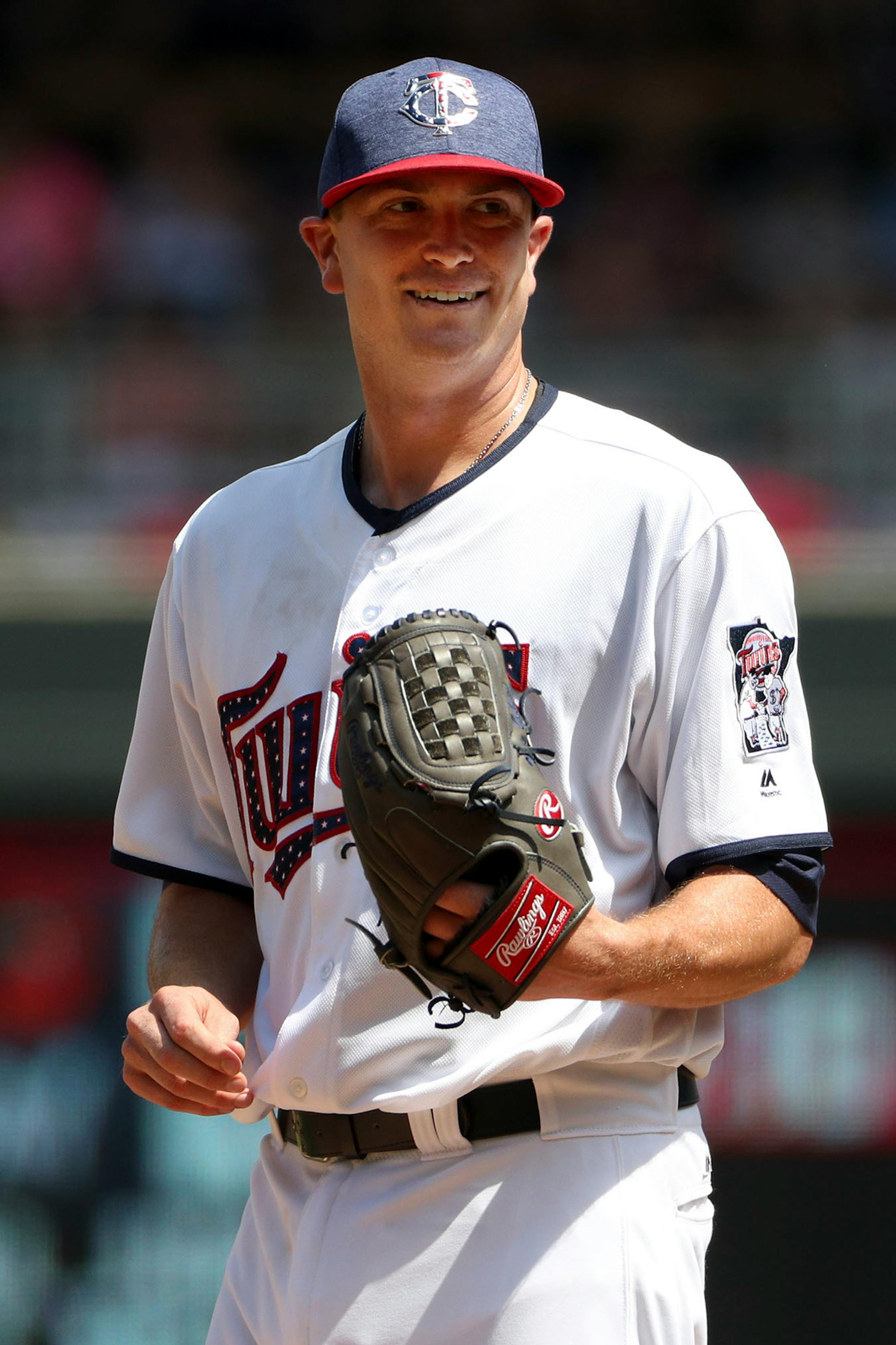 Minnesota Twins starting pitcher Kyle Gibson (44) smiled after getting an out in the fifth inning.