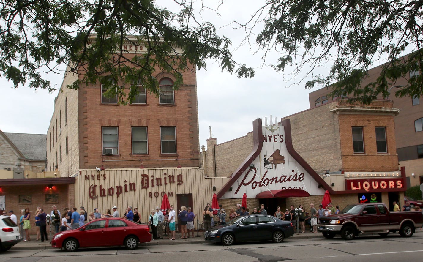 Outdoor Tent and Farewell Party at Nye's Polonaise featuring The World's Most Dangerous Polka Band among other bands Saturday, Aug. 22, 2015, in Minneapolis, MN. Here, a long line of people waiting to get into the farewell party lined up down the block.](DAVID JOLES/STARTRIBUNE)djoles@startribune.com Outdoor Tent and Farewell Party at Nye's Polonaise