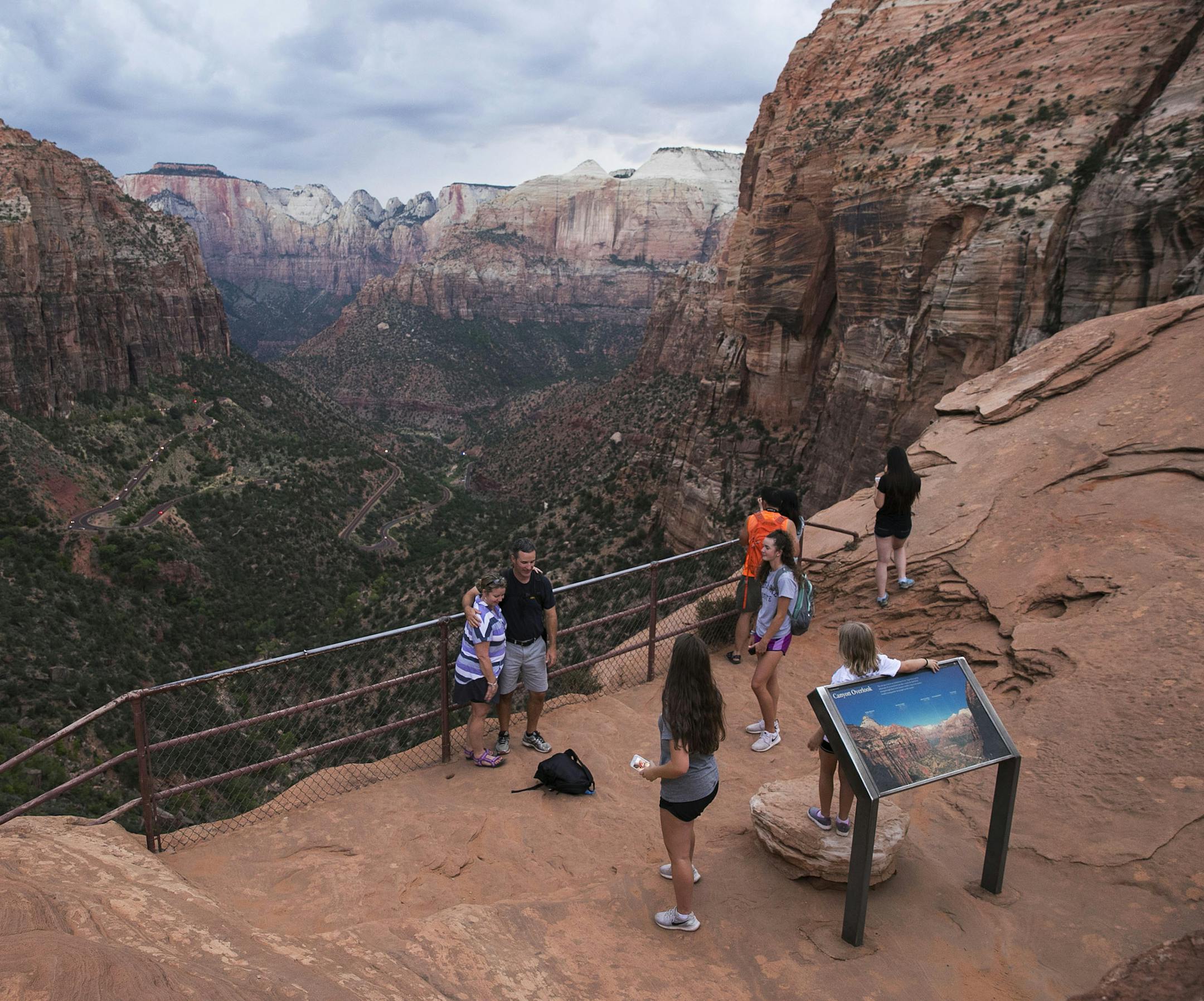 FILE &#xf3; Visitors at the Canyon Overlook in Zion National Park in southwest Utah, Aug. 13, 2017. A Trump administration proposal to steeply increase entrance fees to the most popular national parks landed with a thud when it was presented in November, and park officials say they are now reconsidering it. (Ruth Fremson/The New York Times)