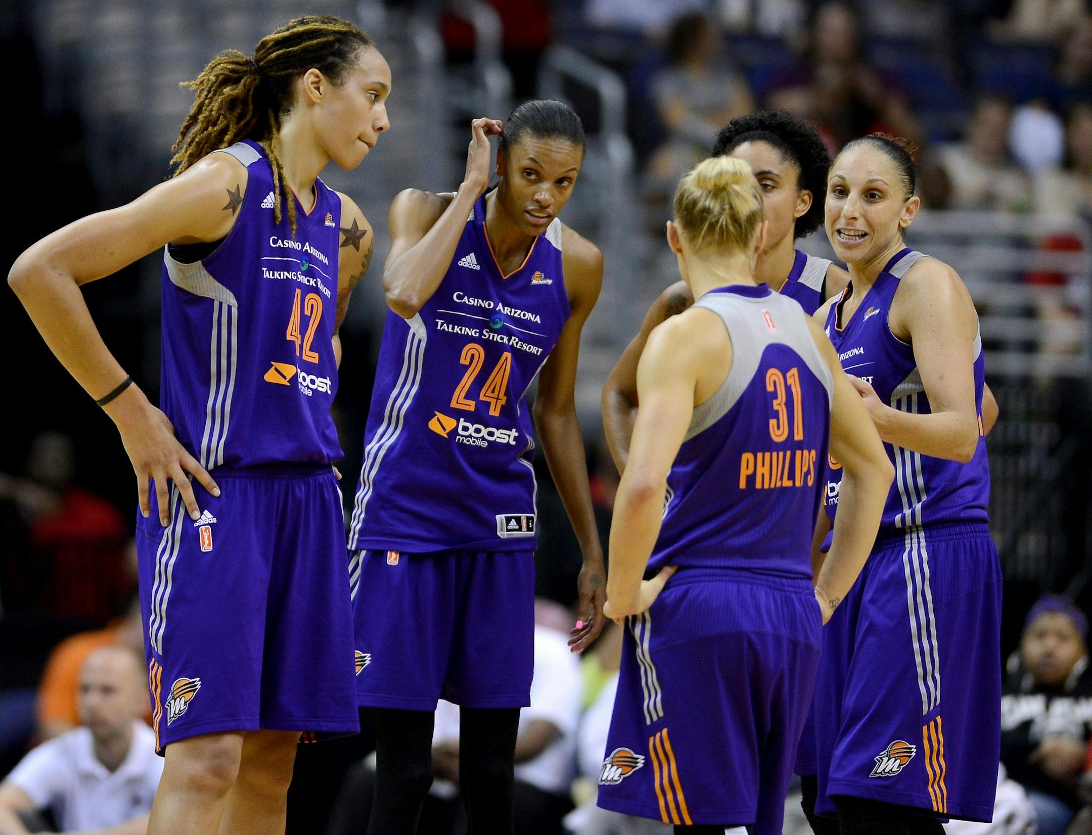 Phoenix Mercury guard Diana Taurasi (3), right, speaks with teammates, Mercury center Brittney Griner (42), Mercury forward DeWanna Bonner (24), Mercury forward Candice Dupree (4) and Mercury guard Erin Phillips (31), during a timeout in the fourth quarter against the Washington Mystics at the Verizon Center in Washington, Tuesday, June 10, 2014. The Mercury defeated the Mystics, 81-66. (Chuck Myers/MCT) ORG XMIT: 1153831