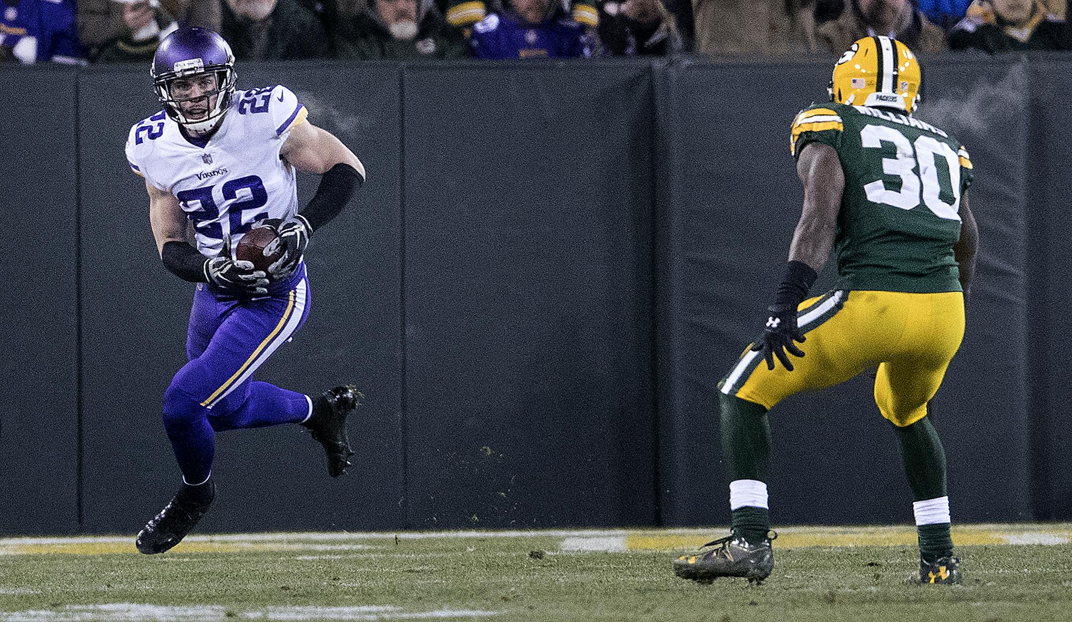 Minnesota Vikings defensive back Harrison Smith (22) intercepts a pass against the Green Bay Packers in the second quarter on Saturday, Dec. 23, 2017, at Lambeau Field in Green Bay, Wis. (Carlos Gonzalez/Minneapolis Star Tribune/TNS) ORG XMIT: 1219384