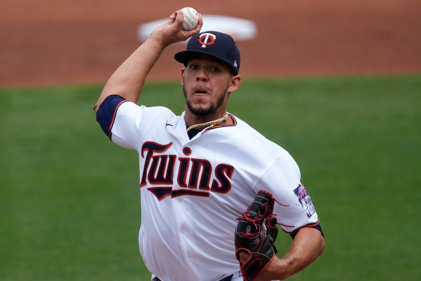 Minnesota Twins starting pitcher Jose Berrios (17) works in the first inning of a spring training baseball game against the Atlanta Braves Monday, March 22, 2021, in Fort Myers, Fla. (AP Photo/John Bazemore)