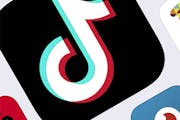 FILE - This Feb. 25, 2020, file photo, shows the icon for TikTok in New York. TikTok says it's working to remove videos of a man apparently taking his