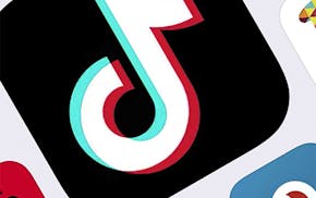FILE - This Feb. 25, 2020, file photo, shows the icon for TikTok in New York. TikTok says it's working to remove videos of a man apparently taking his