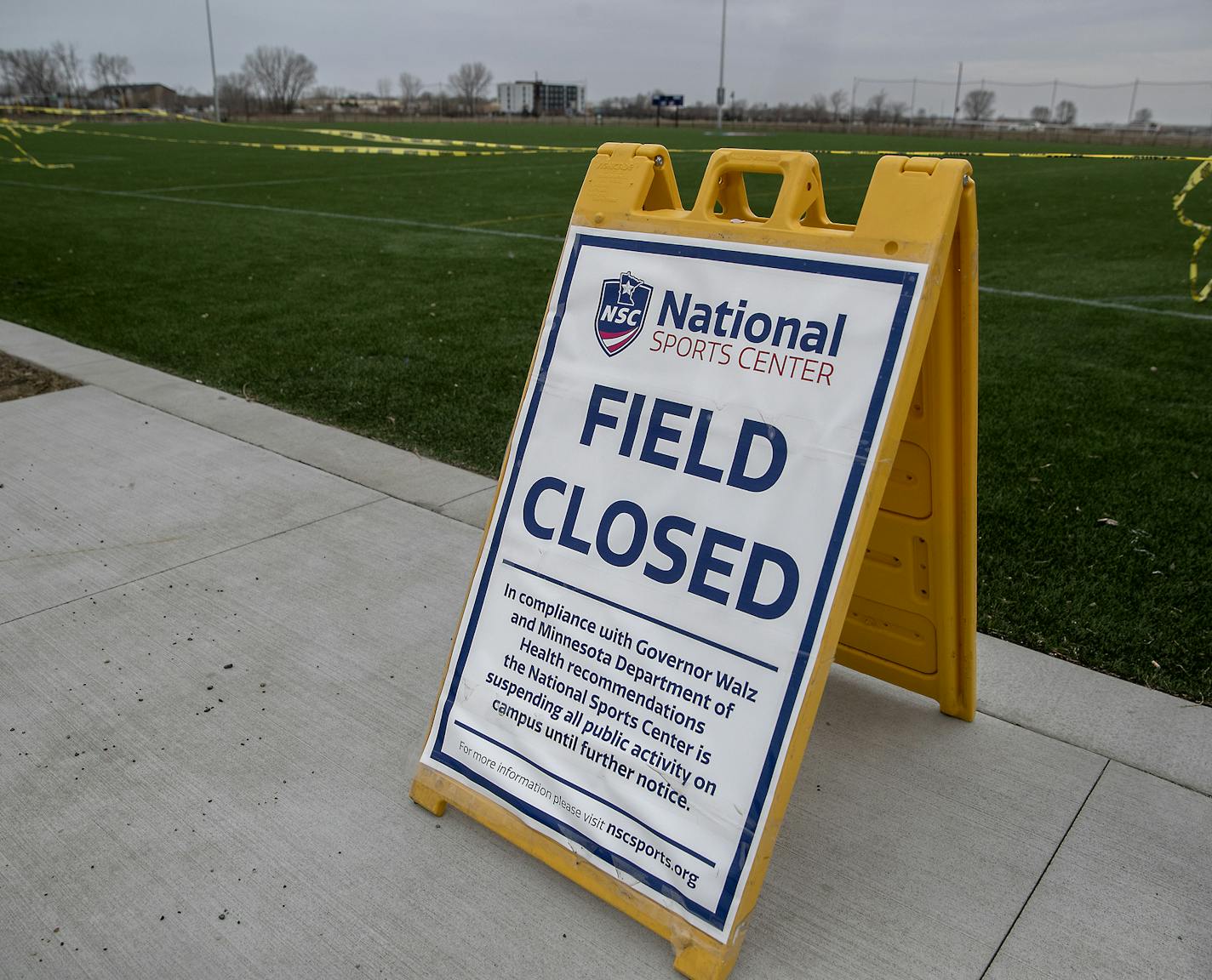 A sign and tape marks the closing of one of the many fields at the National Sports Center Thursday, April 2, 2020 in Blaine, MN. ] ELIZABETH FLORES &#x2022; liz.flores@startribune.com