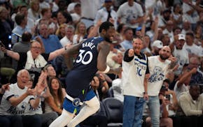 Timberwolves’s Julius Randle reacts after scoring against the Golden State Warriors in the fourth quarter in Game 5 of their NBA Western Conference