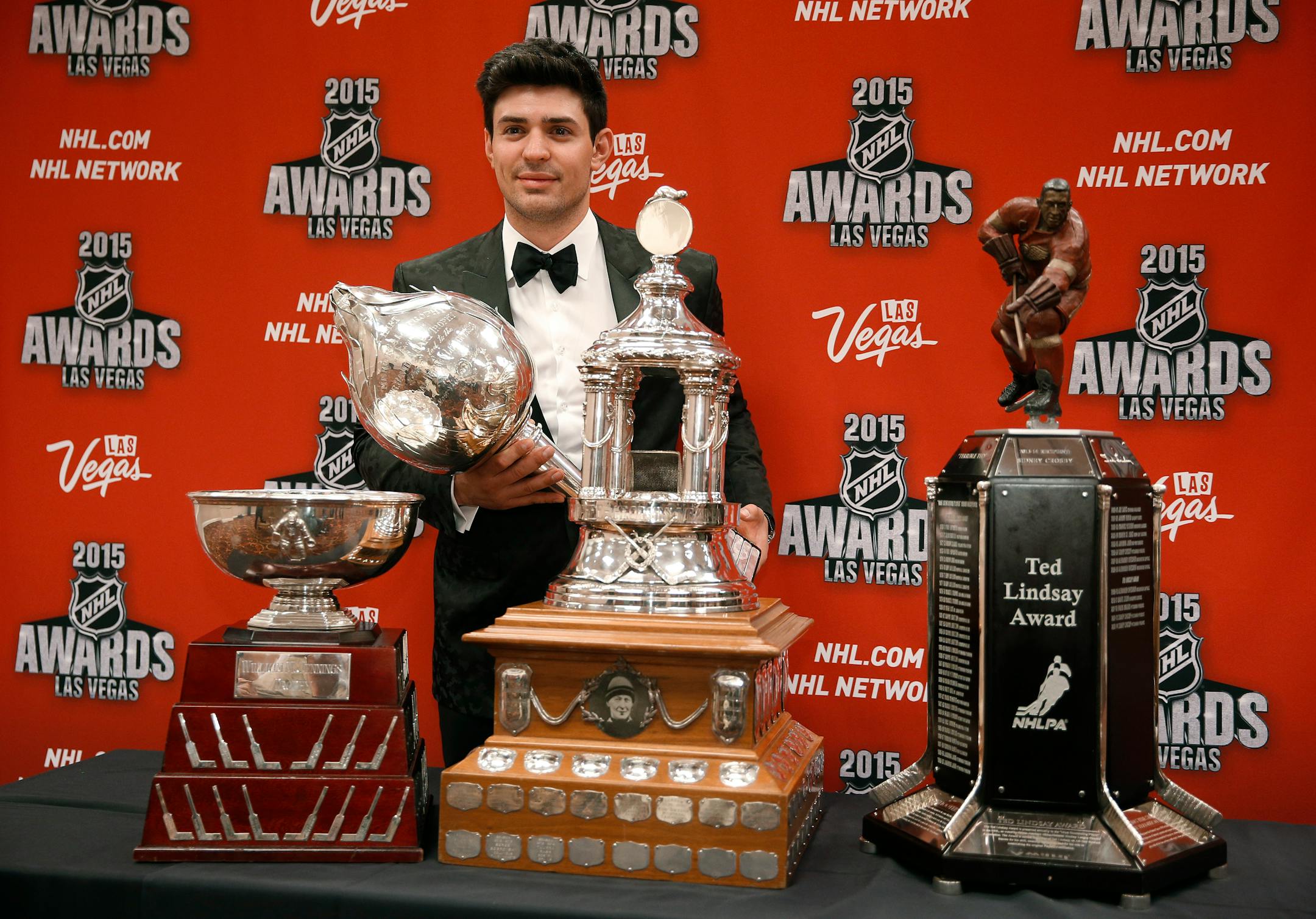 Montreal Candiens goalie Carey Price posed with trophies for awards he won at the NHL Awards Show on Wednesday in Las Vegas.