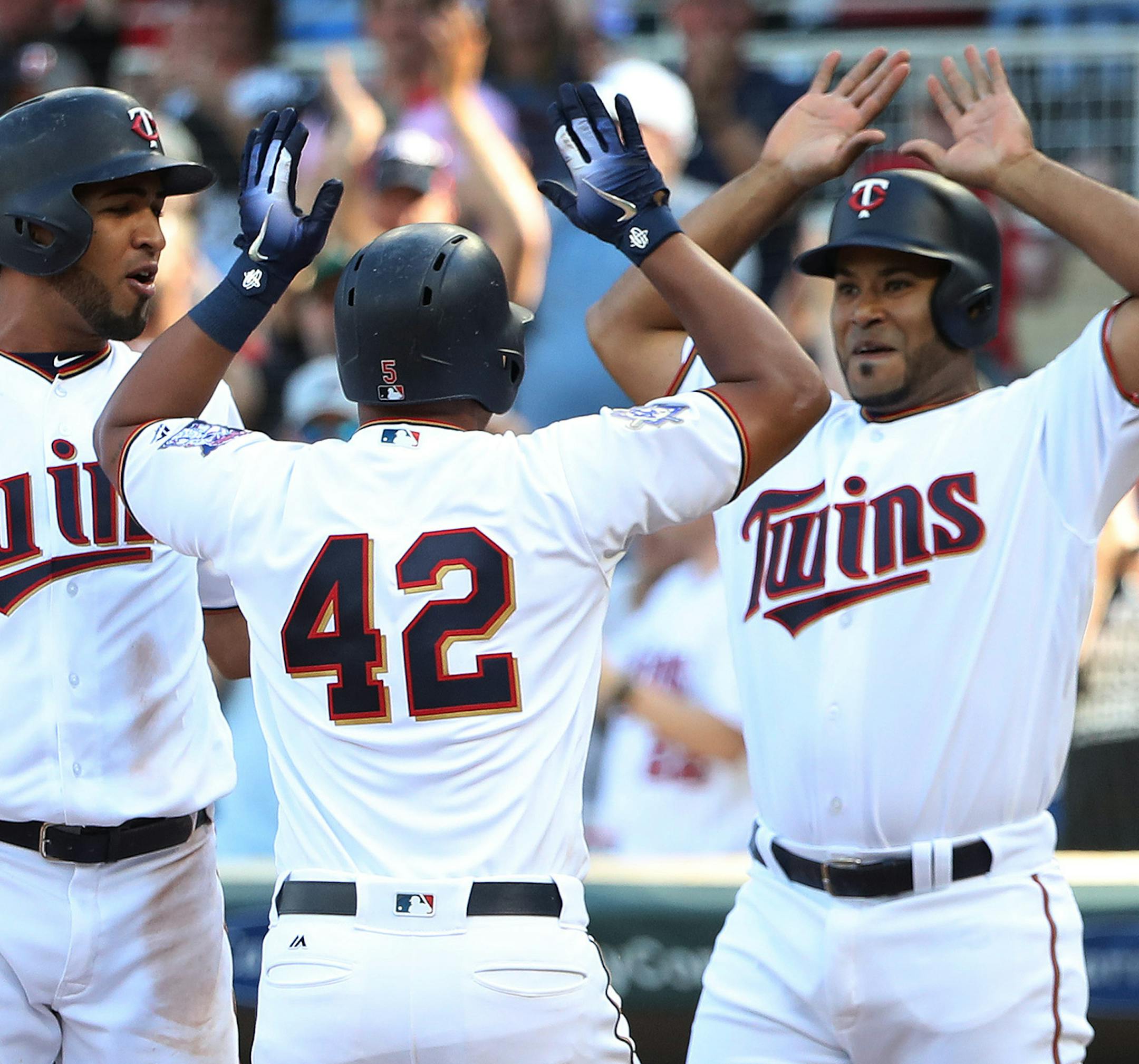 Minnesota Twins third baseman Eduardo Escobar (5) (center) celebrated his eight inning 3 run homer with Eddie Rosario left and Gregoria Petit June 5, 2018 in Minneapolis , MN. ] The Minnesota Twins beat the Chicago White Sox 4-2 in the first game of a double hitter at Target Field. JERRY HOLT ï jerry.holt@startribune.com