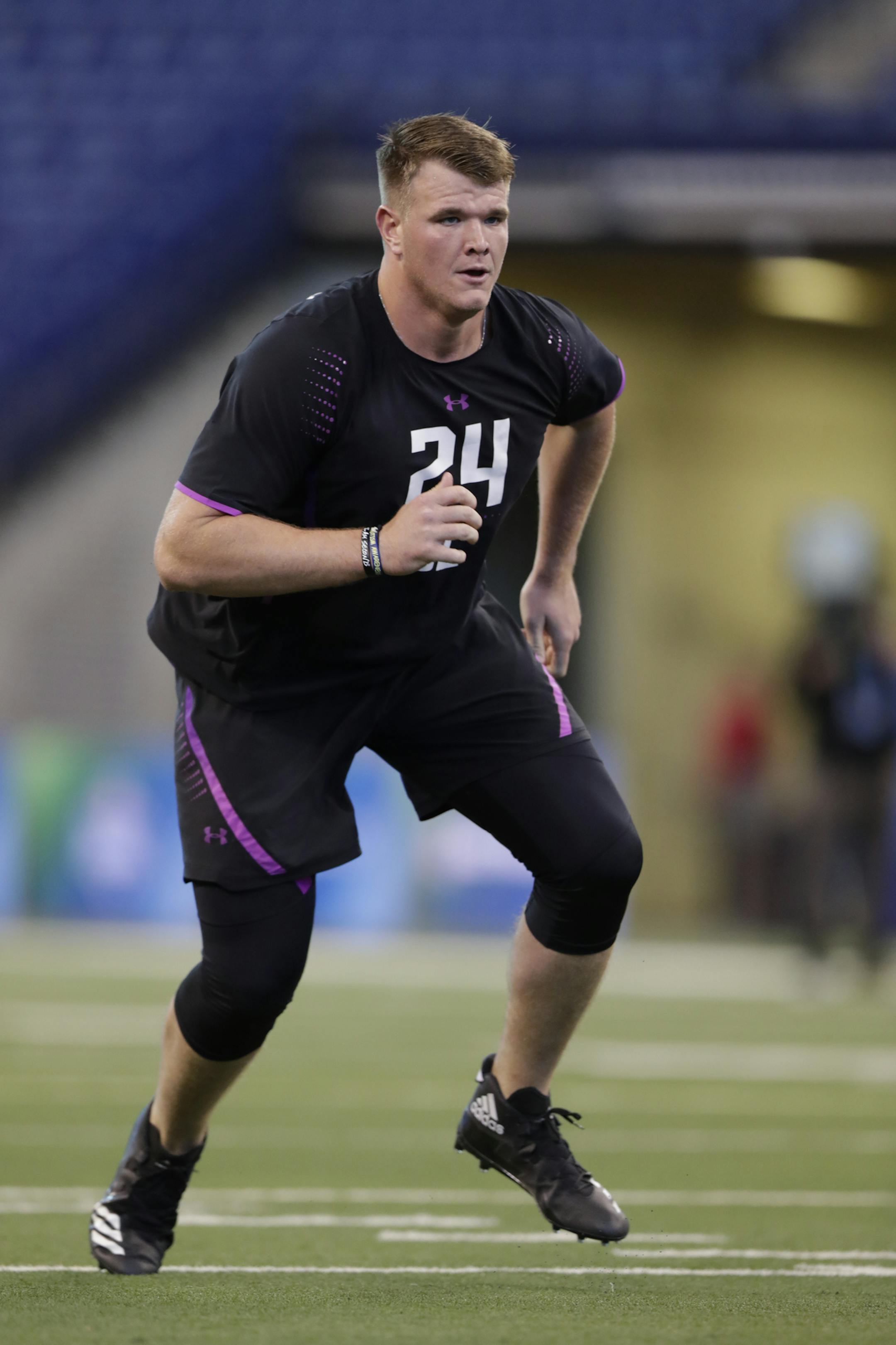 Notre Dame offensive lineman Mike McGlinchey runs a drill at the NFL football scouting combine in Indianapolis, Friday, March 2, 2018. (AP Photo/Michael Conroy)