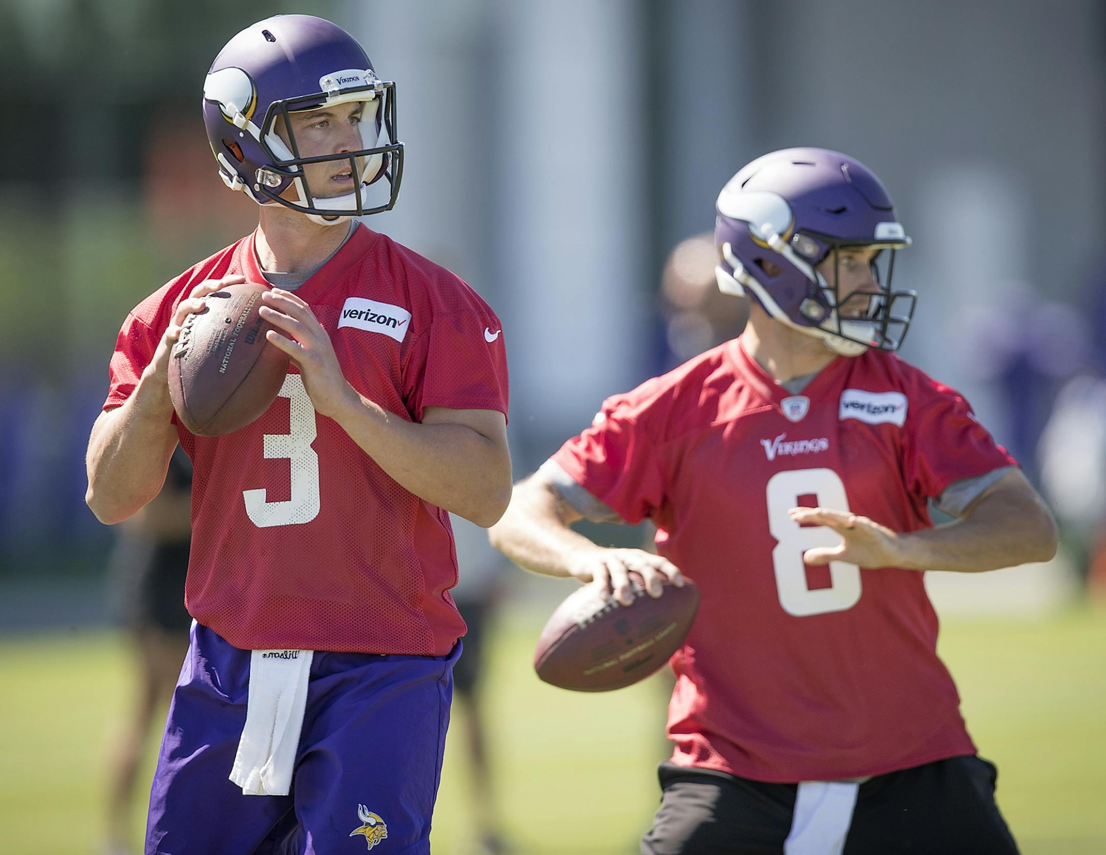 Vikings quarterback Trevor Siemian, left, ran drills alongside quarterback Kirk Cousins during a mandatory Vikings three-day minicamp at the TCO Performance Center, June 13, 2018 in Eagan, MN.