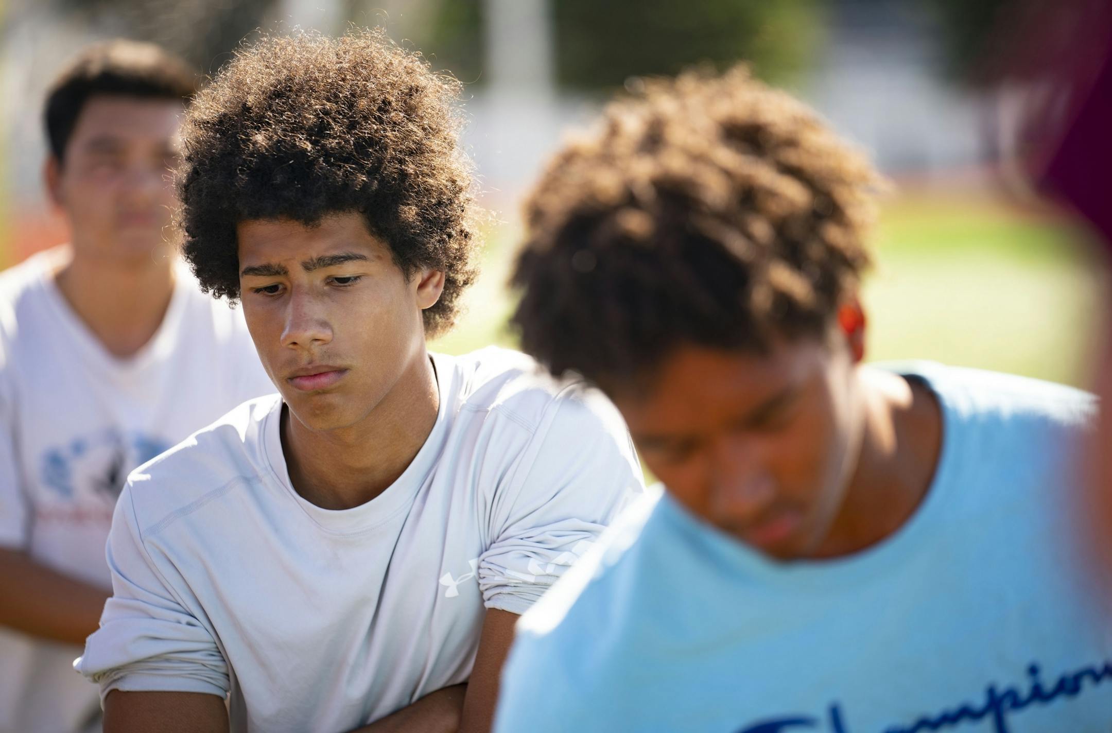 KJ Pulliam reacted as he listened to Denfeld head coach Erik Lofald talked to the team about the MSHSL decision to move football to the spring.