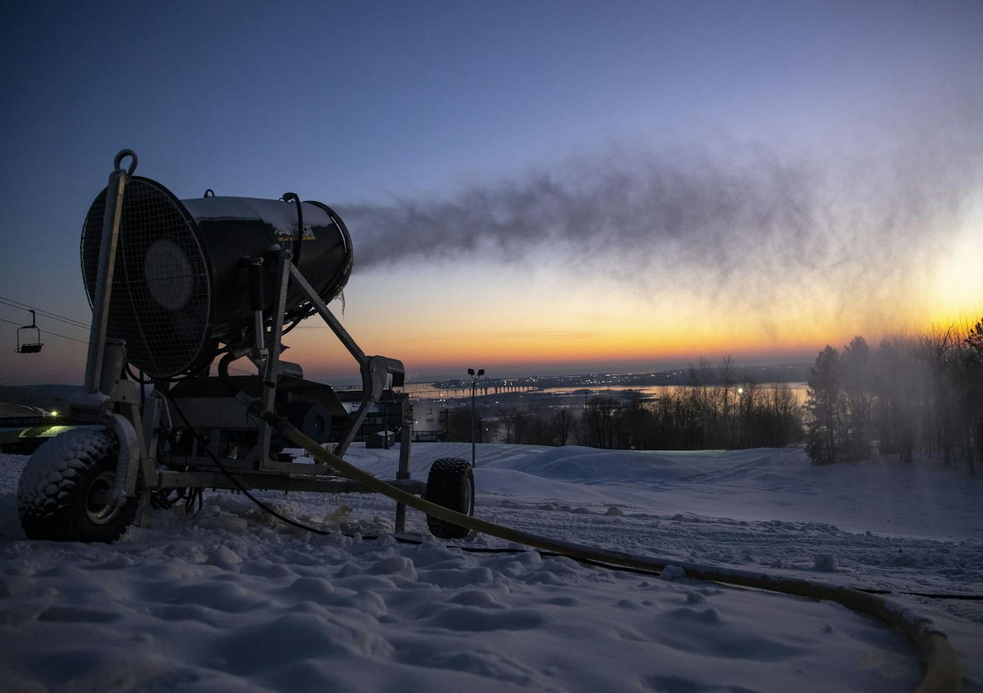 The sun rose over Spirit Mountain as a snow maker blew fresh snow on the slope on Wednesday December 2, 2020. ]ALEX KORMANN • alex.kormann@startribune.comSpirit Mountain in Duluth is one of the top skiing destinations in Minnesota, with a stunning panoramic view of Lake Superior and the St. Louis River.