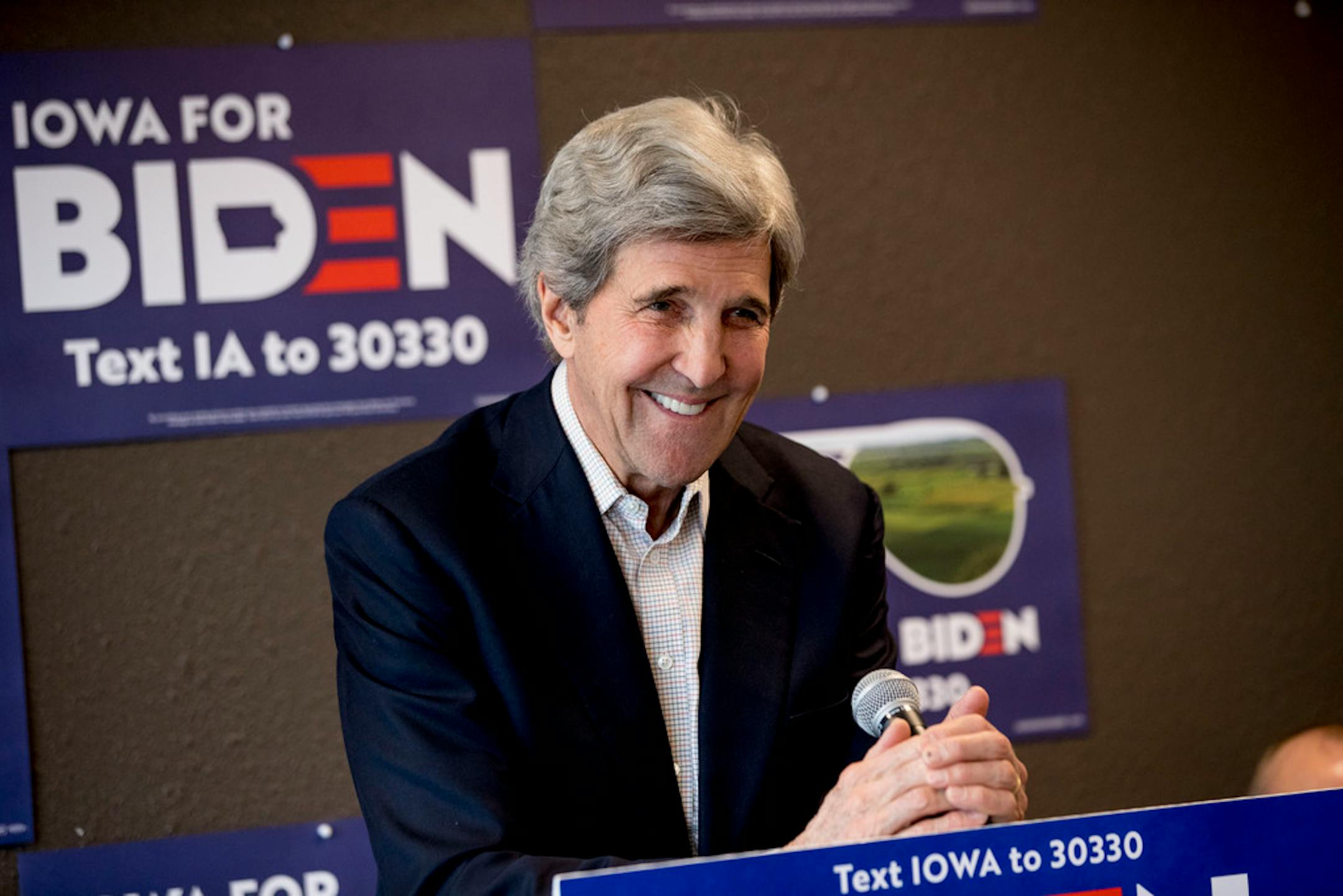 In this Jan. 9, 2020, file photo former Secretary of State John Kerry smiles while speaking at a campaign stop to support Democratic presidential candidate former Vice President Joe Biden in Fort Dodge, Iowa.