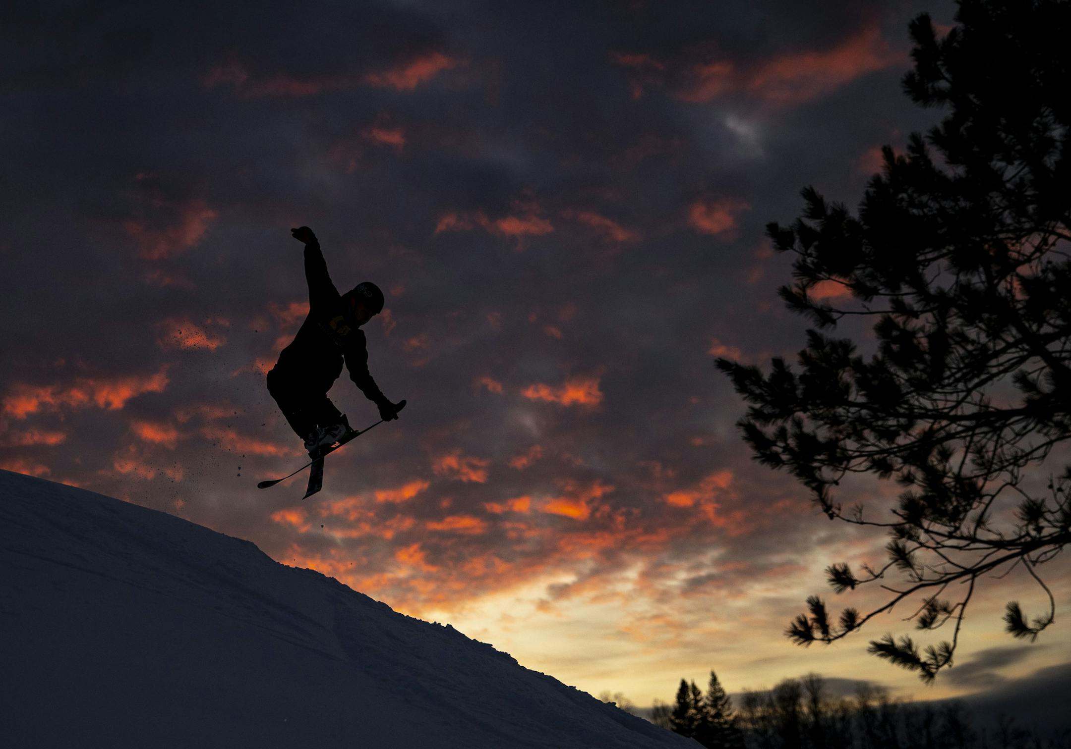 A skier jumped off a snow bank at Mont Du Lac ski resort on opening day on Thursday. ]
ALEX KORMANN • alex.kormann@startribune.com Mont Du Lac ski resort in Superior, WI opened it's slopes for the first runs of the season on Thursday November 14, 2019. They offered half off rentals and free lift tickets for everyone who wanted to come out and get their first fill of powder.