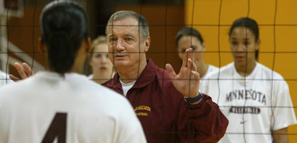 Mike Hebert worked with his players during practice in 2009.
