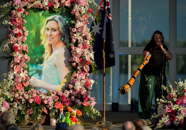 Johanna Morrow was one of two musicians to play the didgeridoo during Justine Damond's memorial ceremony at Lake Harriet in Minneapolis on Friday, Aug