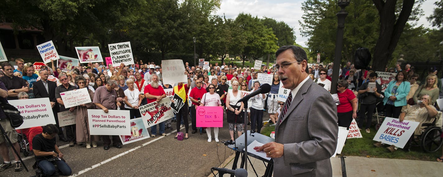 In front of the governor's mansion in St. Paul, pro-life activists gathered to ask Gov. Mark Dayton to investigate Planned Parenthood and calling for legislators to defund the organization. Brian Gibson, executive director of Pro-Life Action Ministries was leading the crowd of over 500.]Richard Tsong-Taatarii/rtsong-taatarii@startribune.com