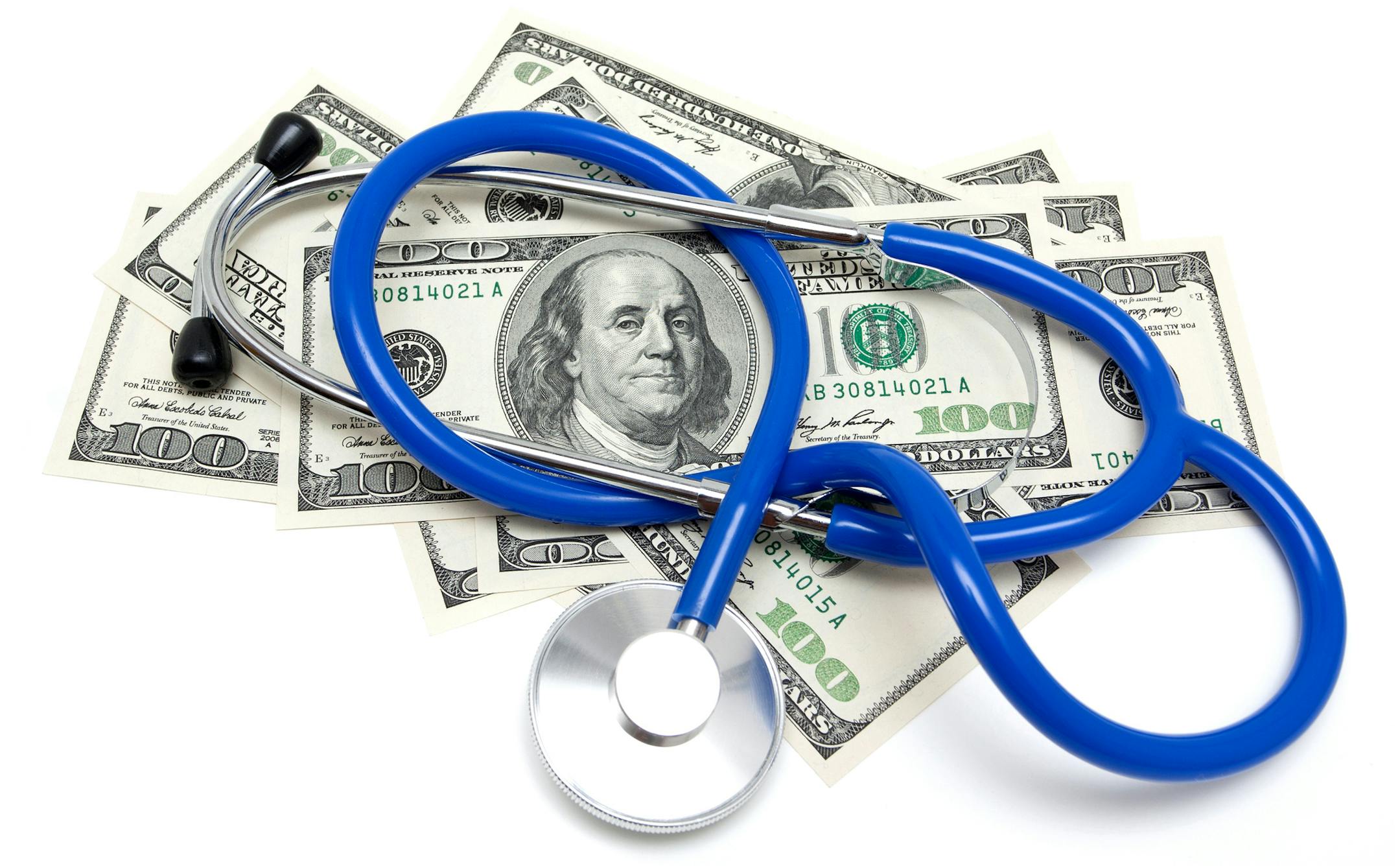 iStock
Stethoscope on US dollars isolated on white background.