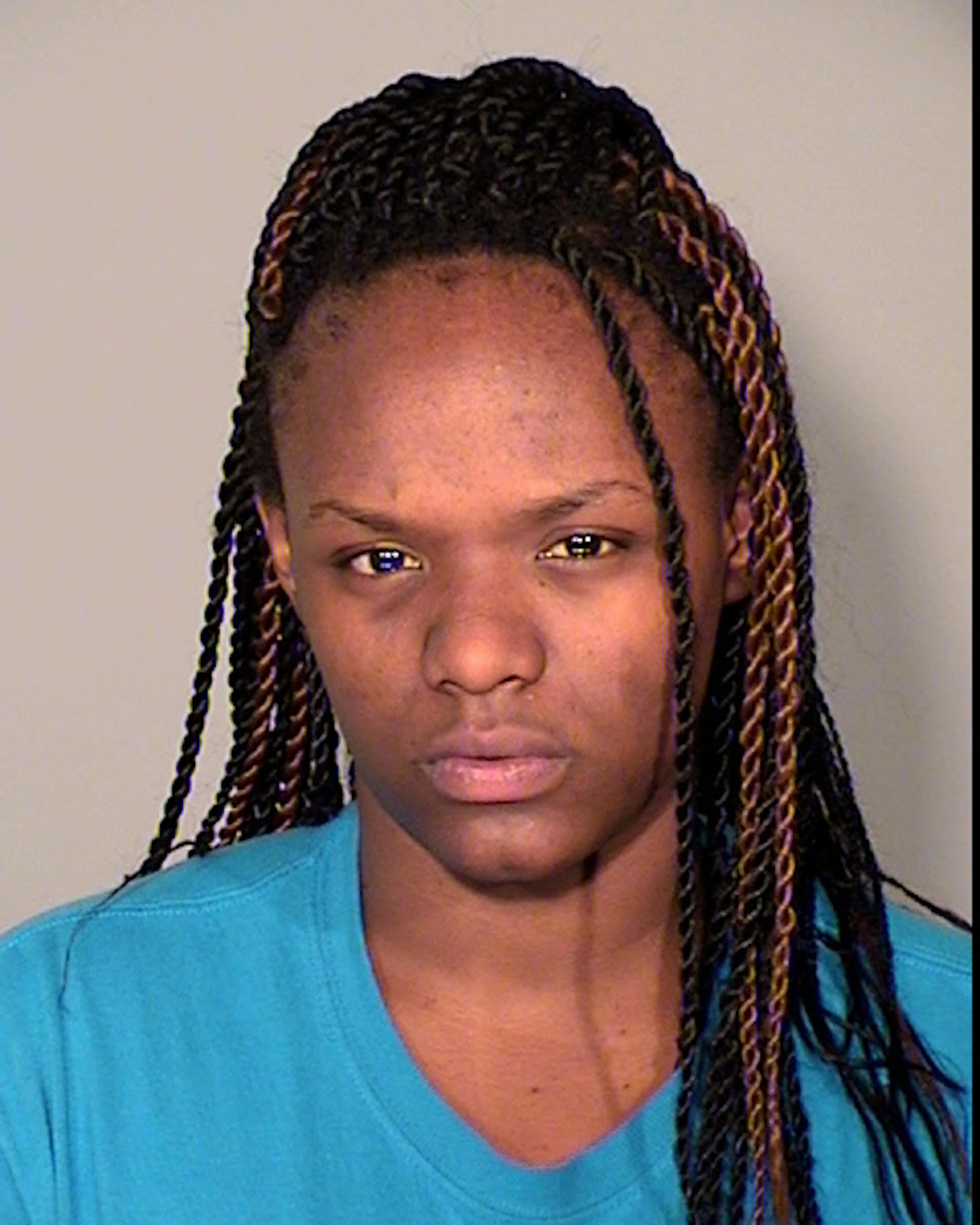 Tashay C. Johnson is charged with abusing her stepson.
