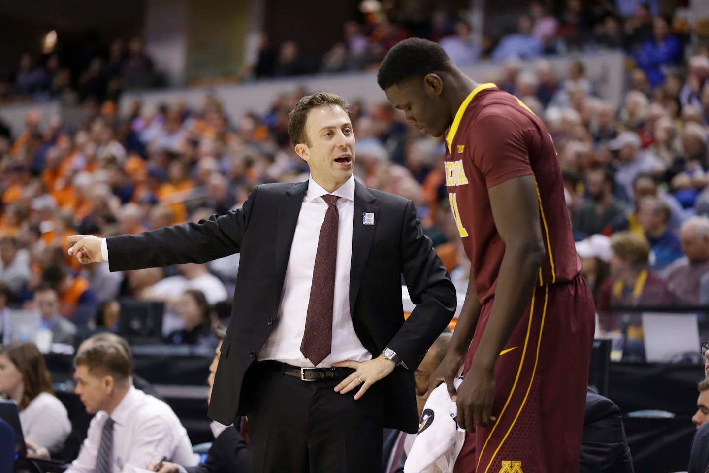 Minnesota's head coach Richard Pitino talks to Gaston Diedhiou (41) in the second half of an NCAA college basketball game against Illinois at the Big Ten Conference tournament, Wednesday, March 9, 2016, in Indianapolis. Illinois won 85-52. (AP Photo/Michael Conroy)