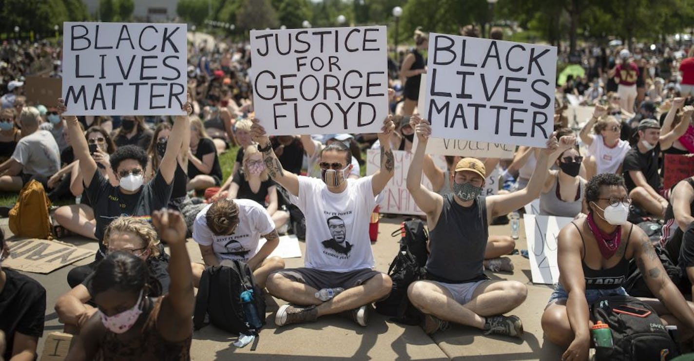 Protesters gathered at the state capitol during a youth rally for George Floyd .