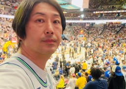 Mitsuaki Ohno takes a selfie during the Timberwolves' Game 7 win over the reigning champion Denver Nuggets.