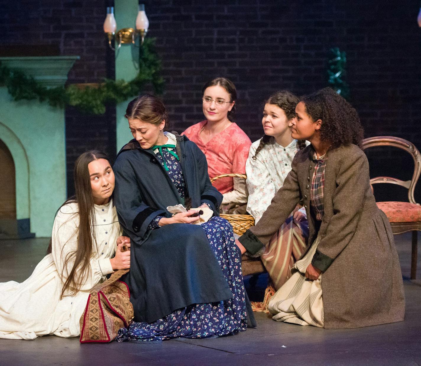 Isabella Star LaBlanc as Beth, Christina Baldwin as Marmee, Christine Weber as Meg, Megan Burns as Amy and C. Michael Menge as Jo in "Little Women" at the Jungle Theater.