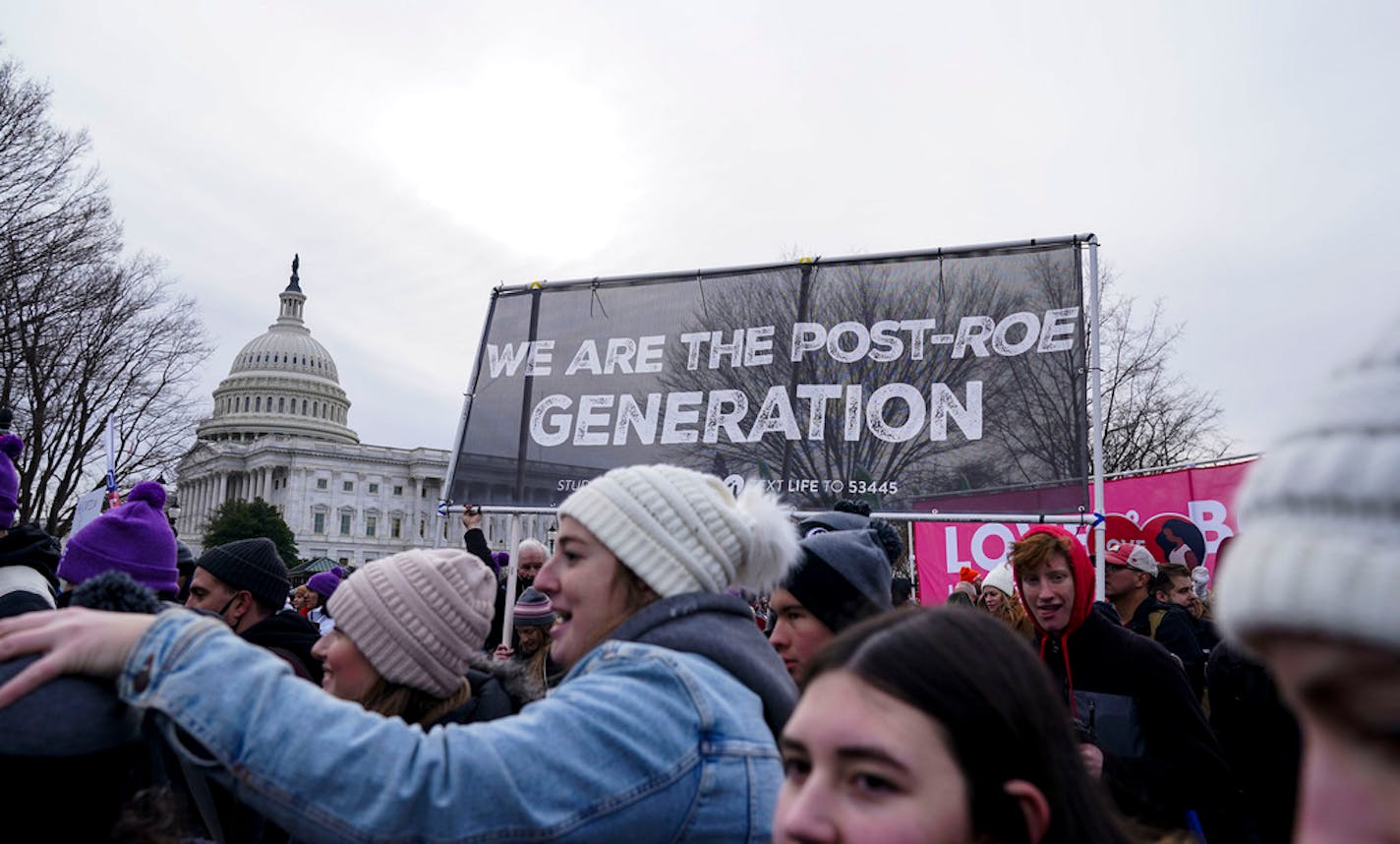 FILE — People participate in the annual March for Life in front of the U.S. Supreme Court in Washington on Jan. 21, 2022. The Supreme Court privately voted to strike down the landmark Roe v. Wade case that has guaranteed the right to abortion for nearly a half-century, according to a leaked draft opinion from February published online Monday May 2, by Politico. (Leigh Vogel/The New York Times)