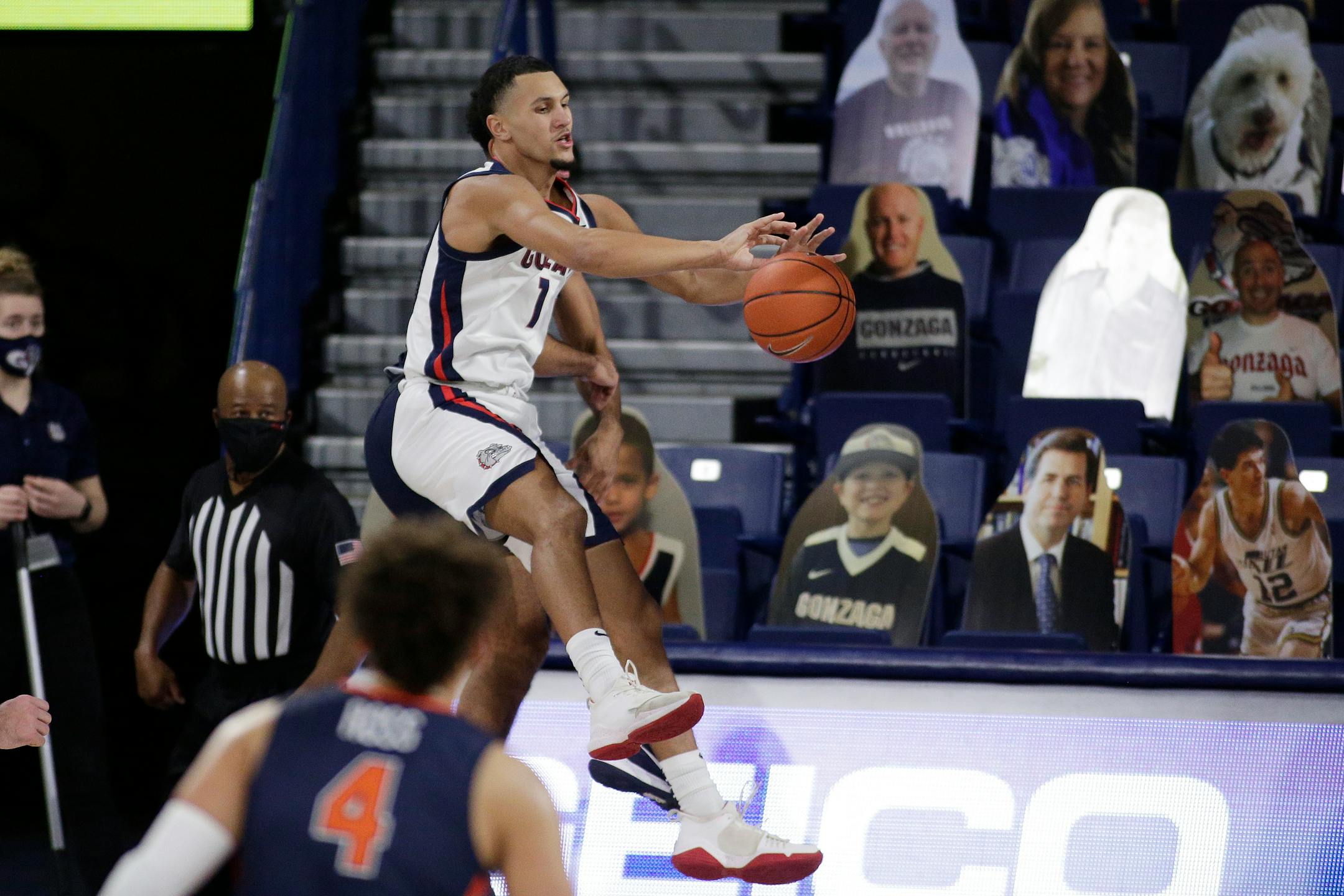 Gonzaga guard Jalen Suggs keeps the ball from going out of bounds during the second half of the team's NCAA college basketball game against Pepperdine in Spokane, Wash., Thursday, Jan. 14, 2021. Gonzaga won 95-70. (AP Photo/Young Kwak)