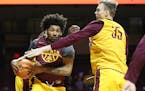 Jordan Murphy pulled down a rebound over Matz Stockman during the University of Minnesota Maroon and Gold Scrimmage at Williams Arena Sunday October 2