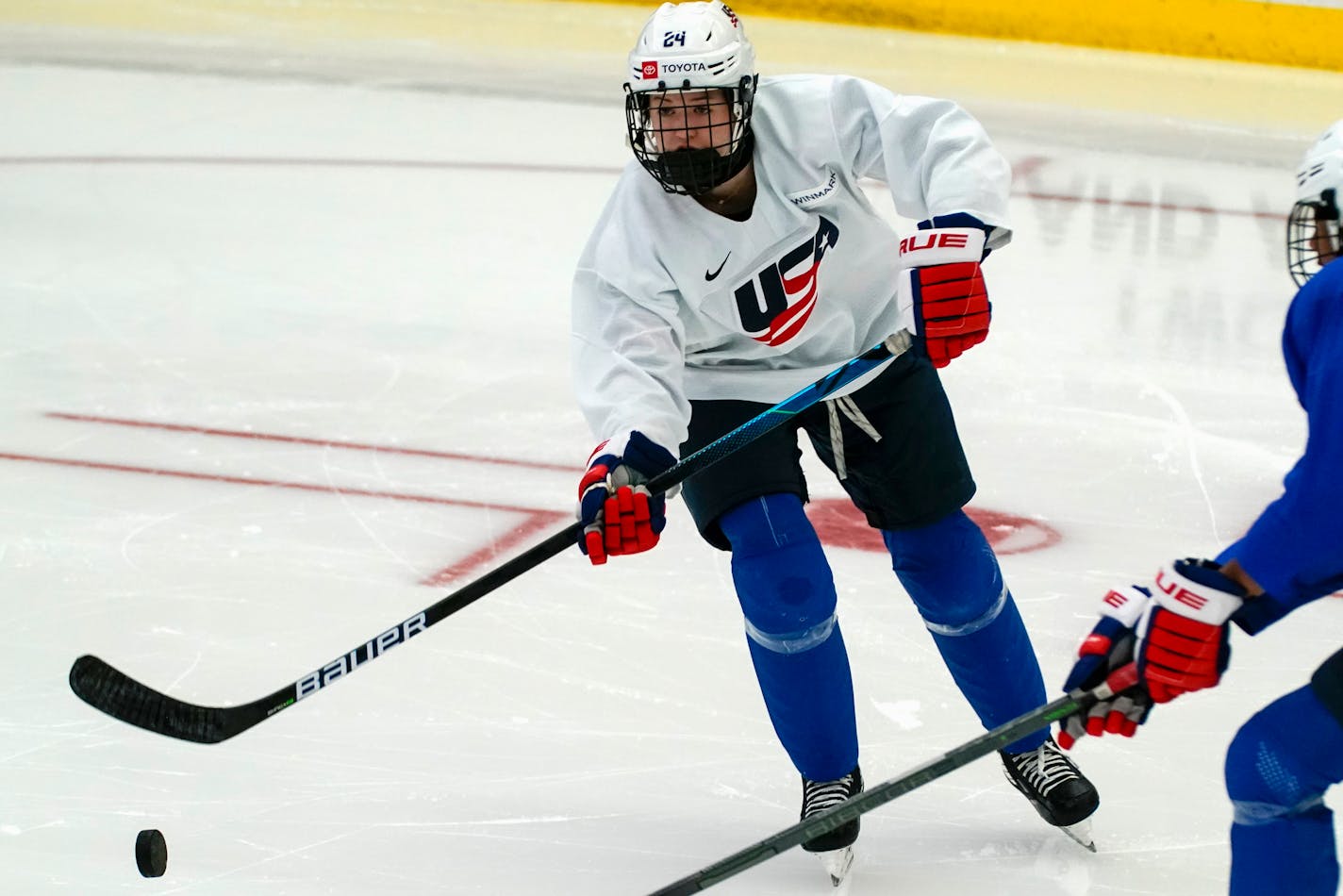 Maggie Scannell practices for the 2022 U.S. U18 Women's World Hockey Championships Saturday, June 11, 2022, in Madison, Wis. Nearly one-third of the players on the U.S. women's hockey team competing in this week's under-18 World Championships are training at programs outside their home states. (AP Photo/Morry Gash)