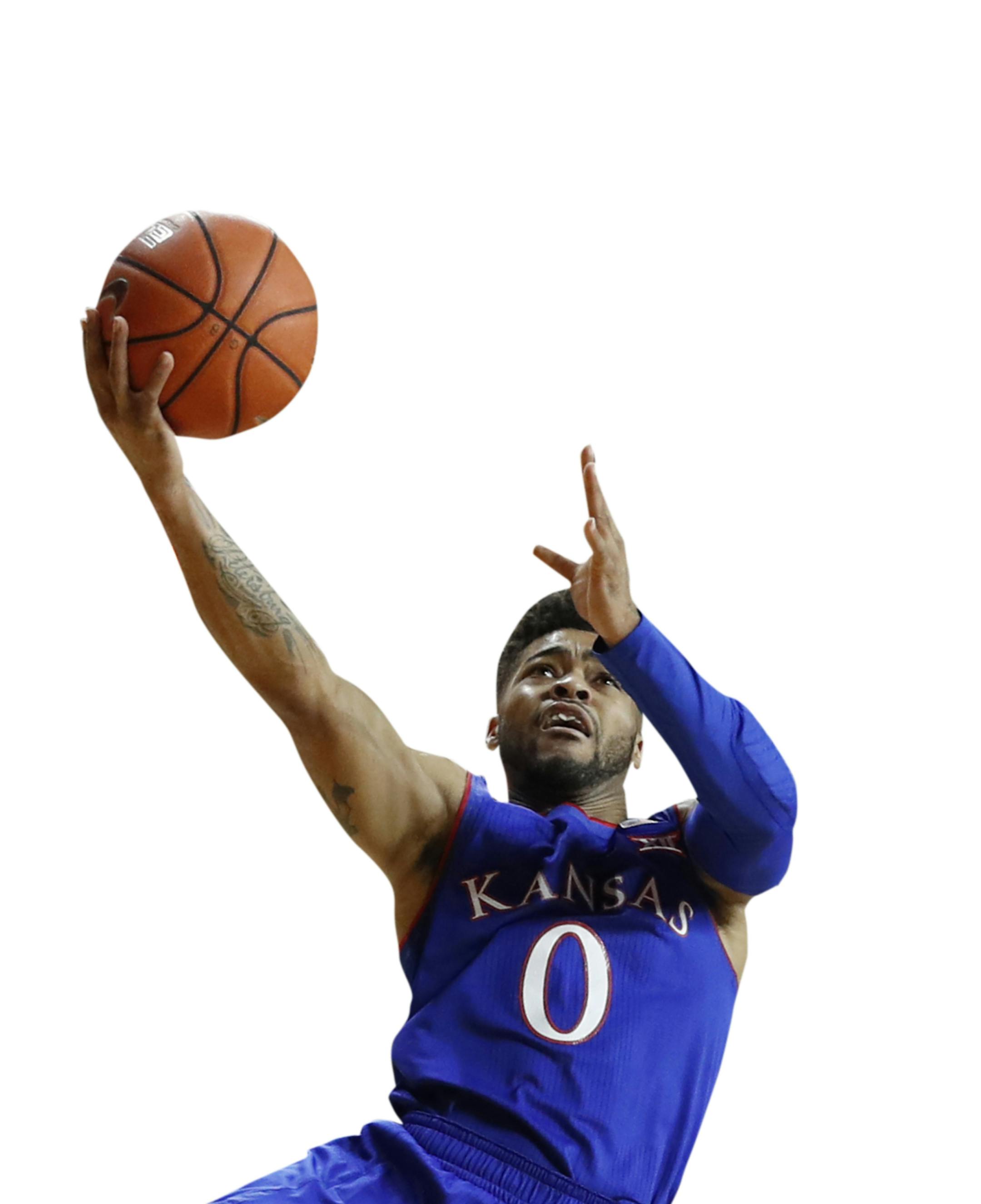 Kansas guard Frank Mason III (0) drives to the basket past Iowa State guard Monte Morris during the first half of an NCAA college basketball game, Monday, Jan. 16, 2017, in Ames, Iowa. (AP Photo/Charlie Neibergall) ORG XMIT: IACN103