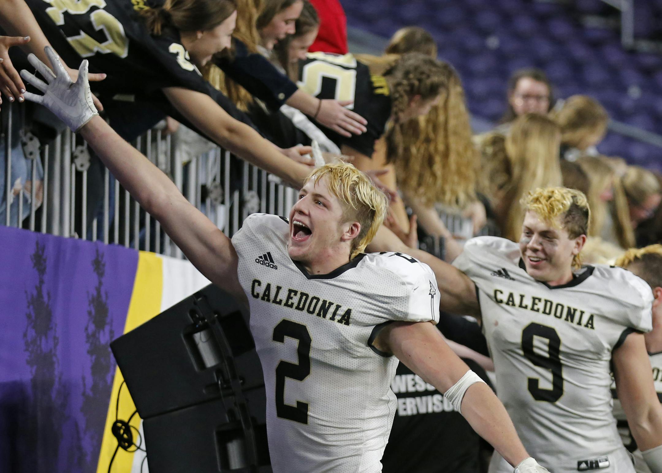 Caledonia players celebrated their fourth straight state title last season.