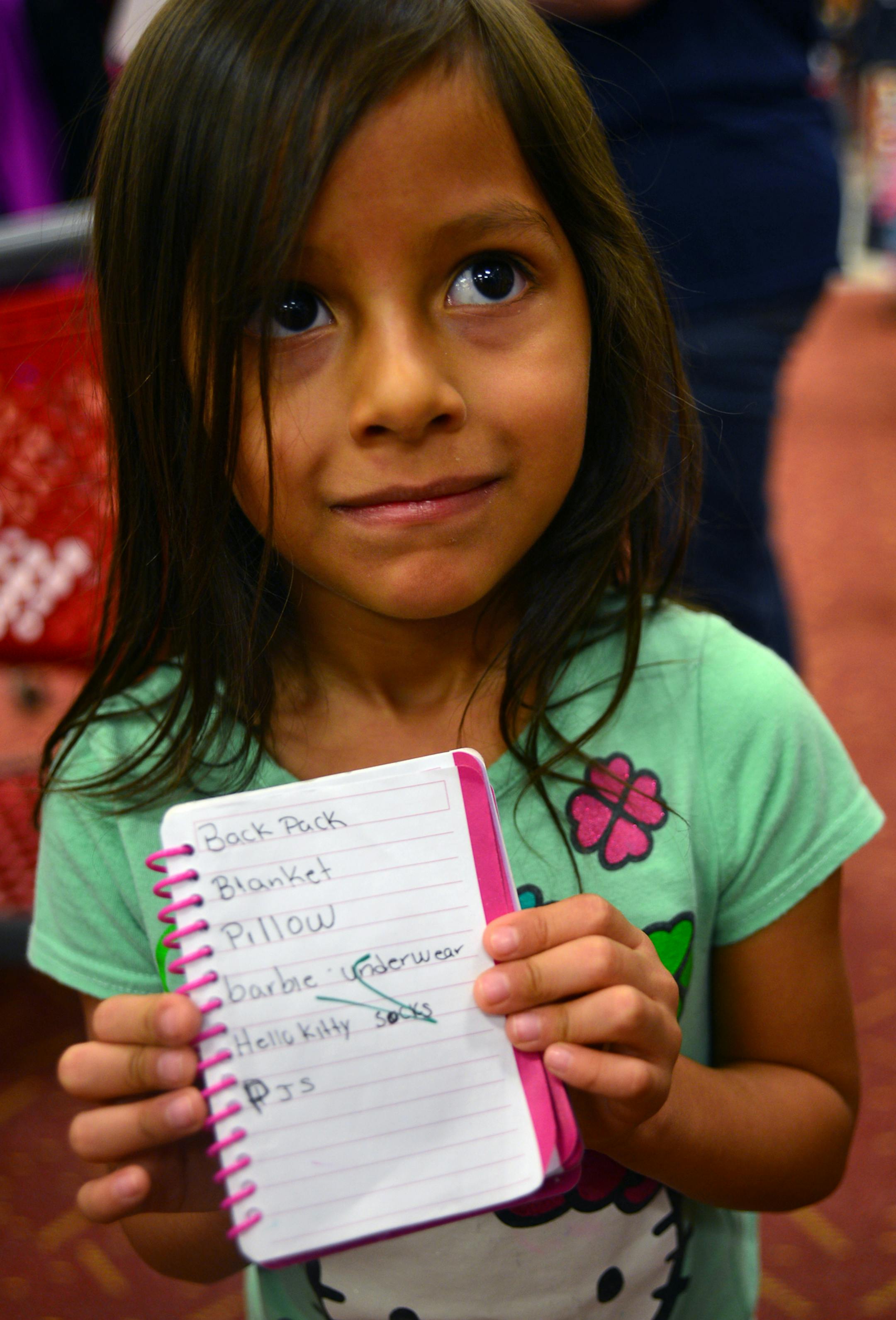 500 students shopped for brand new back-to-school clothes - some of them for the first time. Because of Salvation Army donors these at-risk kids, with the help of their volunteer chaperones, loaded up with $80 worth of shirts, pants and sneakers. At 11 retailers across the metro area. Salvation Army volunteer Lisa Beier, a girls clothing designer for Target helped out 5 year old Kelsy Marquez of Minneapolis.shop for clothes. It turns out that Kelsy choose one of Lisa's designed Pajamas. ] Richar