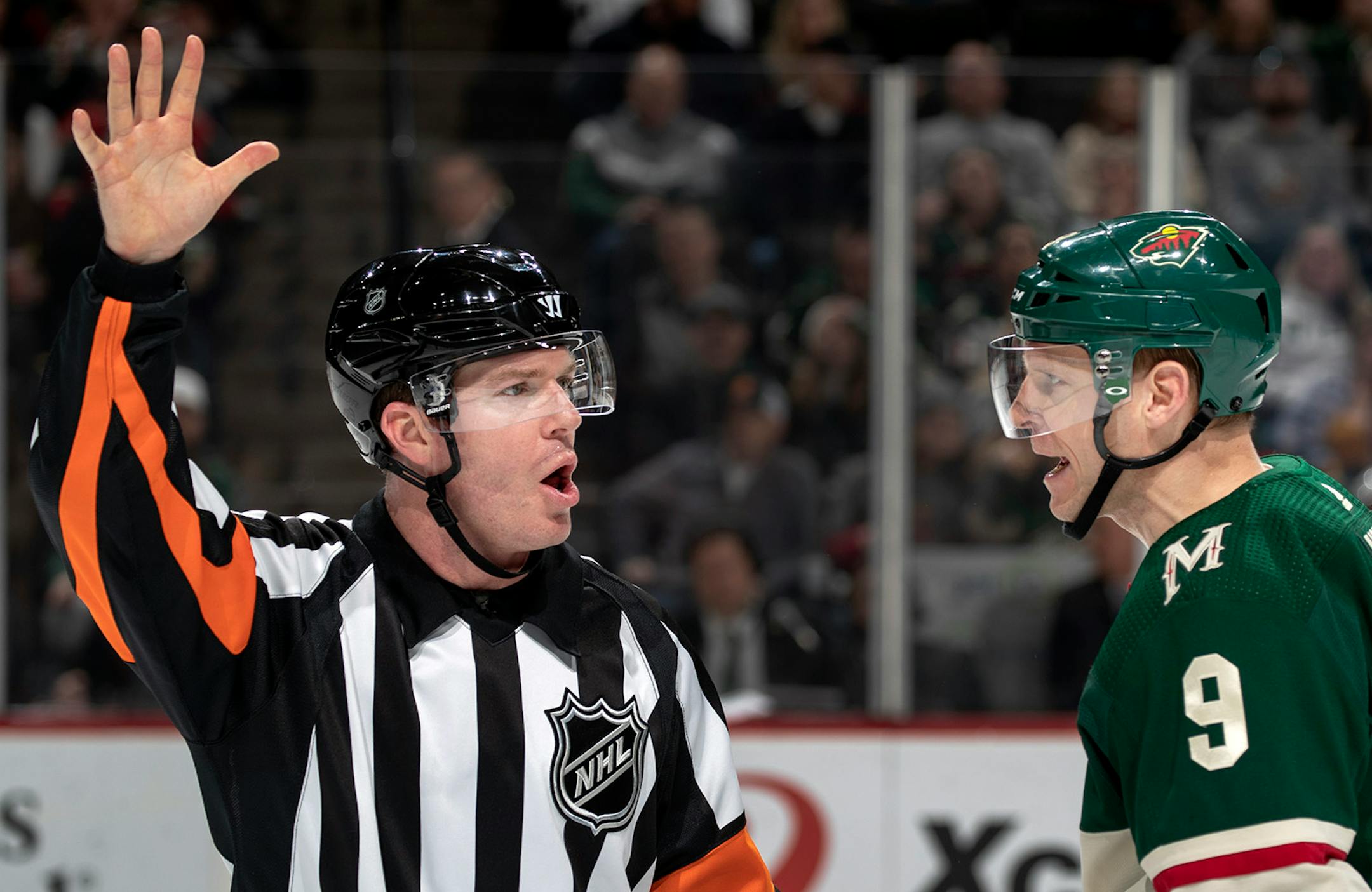 Mikko Koivu (9) of the Minnesota Wild disputed a call the a referee in the second period.