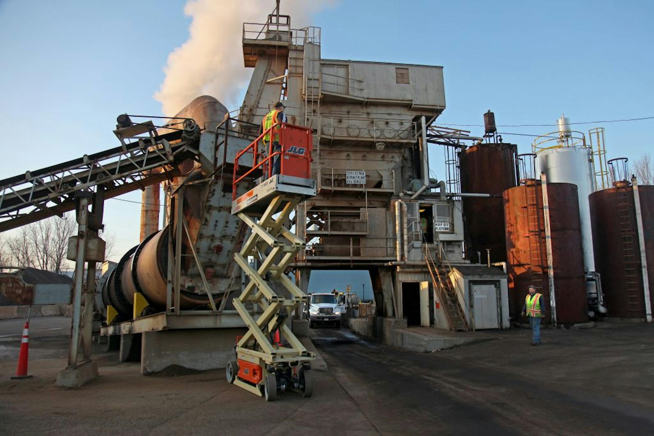 The stuff that comes out of St. Paul's plant is a more permanent fix for potholes that the mixture road crews are forced to use in cold weather. The asphalt mixture made here comes out at a piping hot 335 degrees.