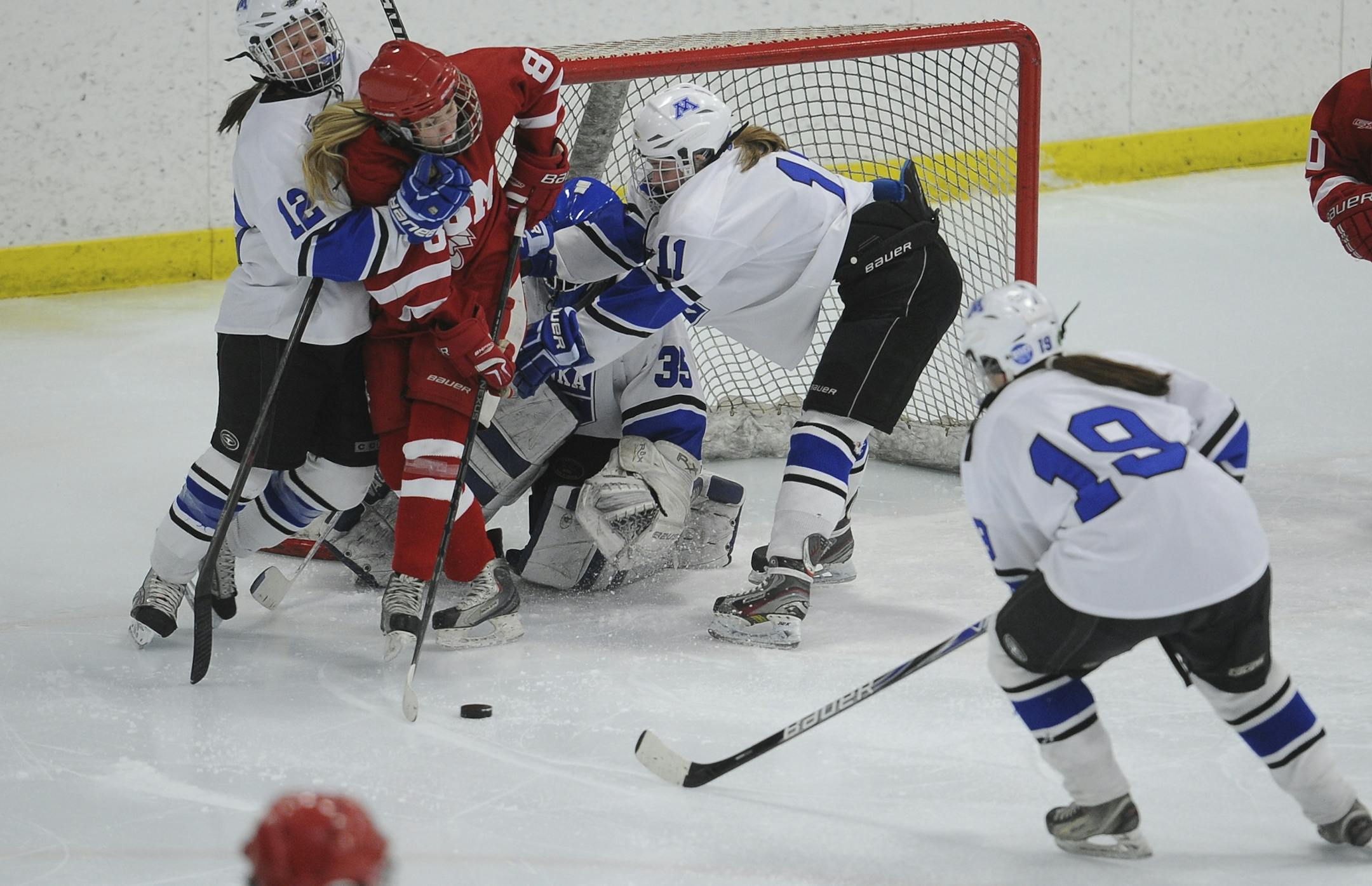 Benilde-St. Margaret's forward Anne Arnason found herself alone in front of the Minnetonka net.