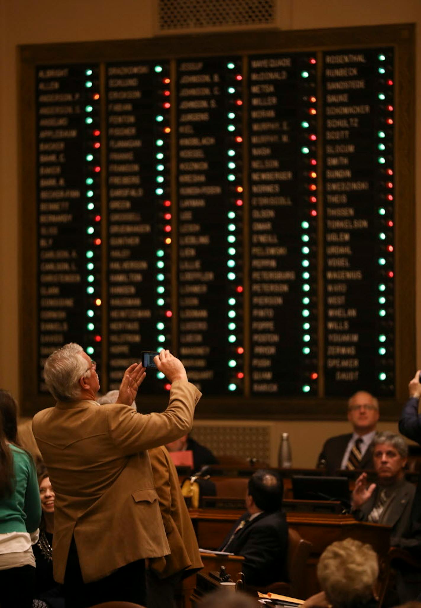 The vote tally board lit up green, indicating a vote for Sunday liquor sales. The eventual total was 85 for, 45 against, with only 68 needed for passage.