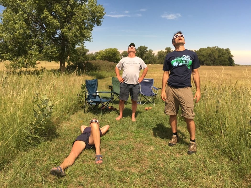 Tammy O'Rourke, Terry O'Rourke and Bob Timmons, from left, and Vivian Timmons (not pictured) waited for totality in August of 2017 in Nebraska.