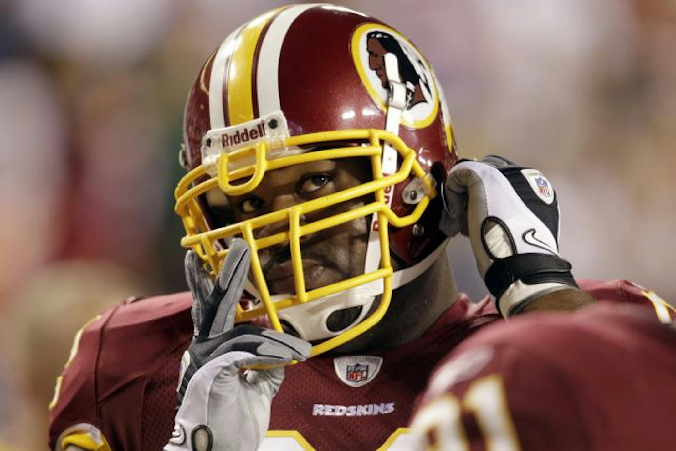 Washington Redskins defensive tackle Albert Haynesworth is shown before the start of an NFL football game between the Redskins and Dallas Cowboys, Sunday, Sept. 12, 2010, in Landover, Md.