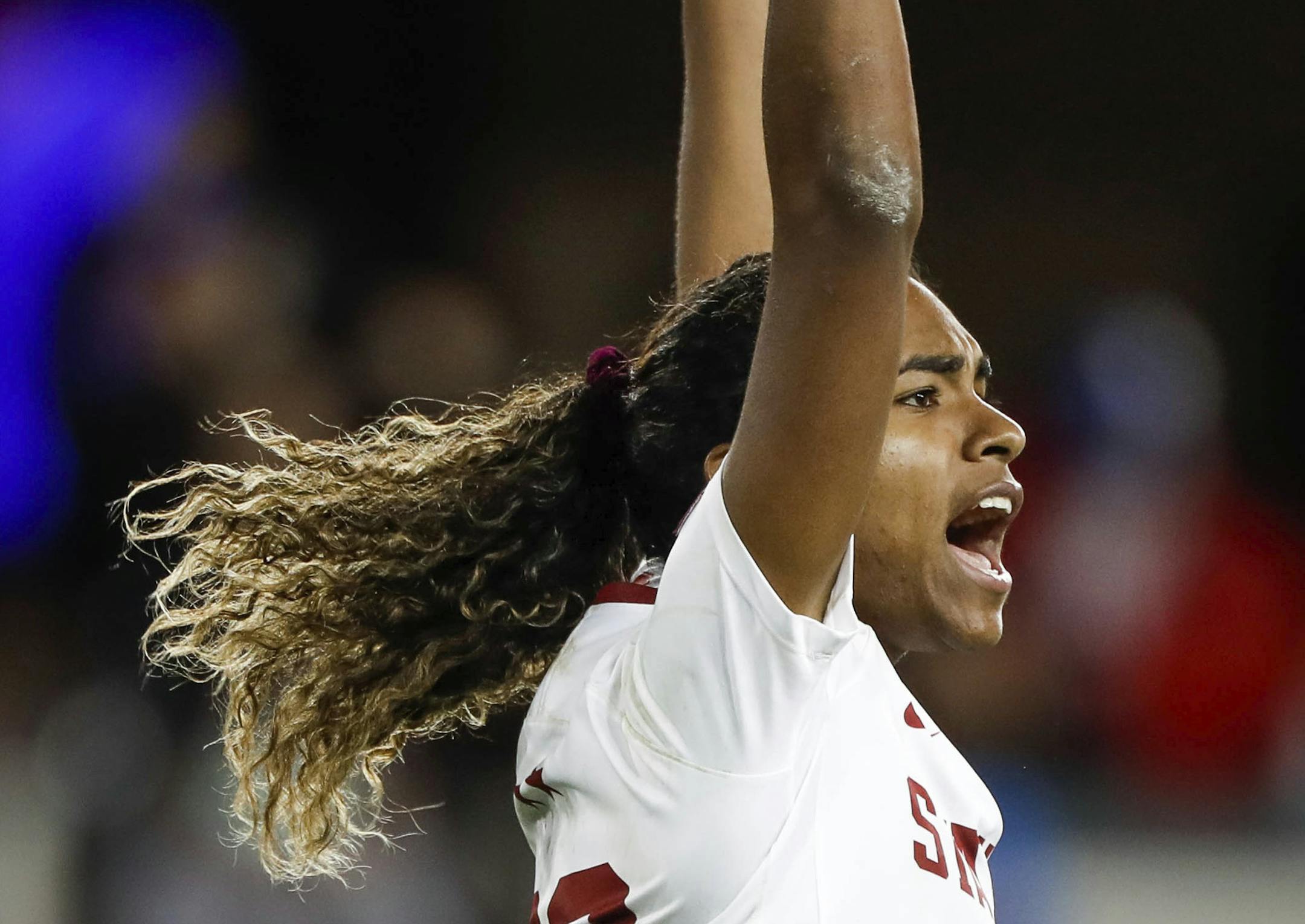 Stanford's Catarina Macario celebrates after scoring a penalty kick against North Carolina during a soccer match in San Jose, Calif., Dec. 8, 2019. Brazilian-born Stanford midfielder Macario is among the players who will take part in the U.S. women's national team training camp this month. The two-time winner of the MAC Hermann Trophy as the nation's best college player, Macario had a Stanford single-season record of 32 goals and 23 assists last year. This is the first time Macario has been call