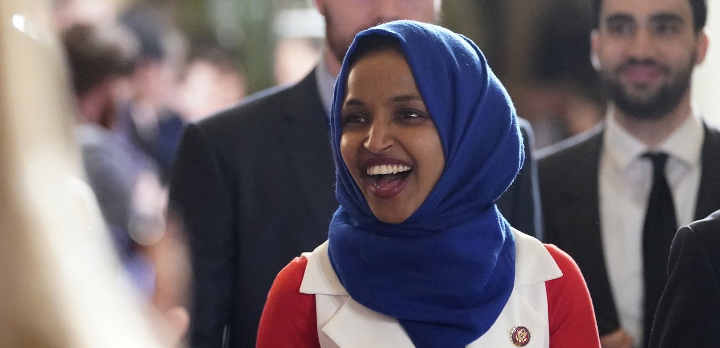 Rep. Ilhan Omar, D-Minn., arrives for President Donald Trump's State of the Union address to a joint session of Congress on Capitol Hill in Washington, Tuesday, Feb. 5, 2019. (AP Photo/Carolyn Kaster)