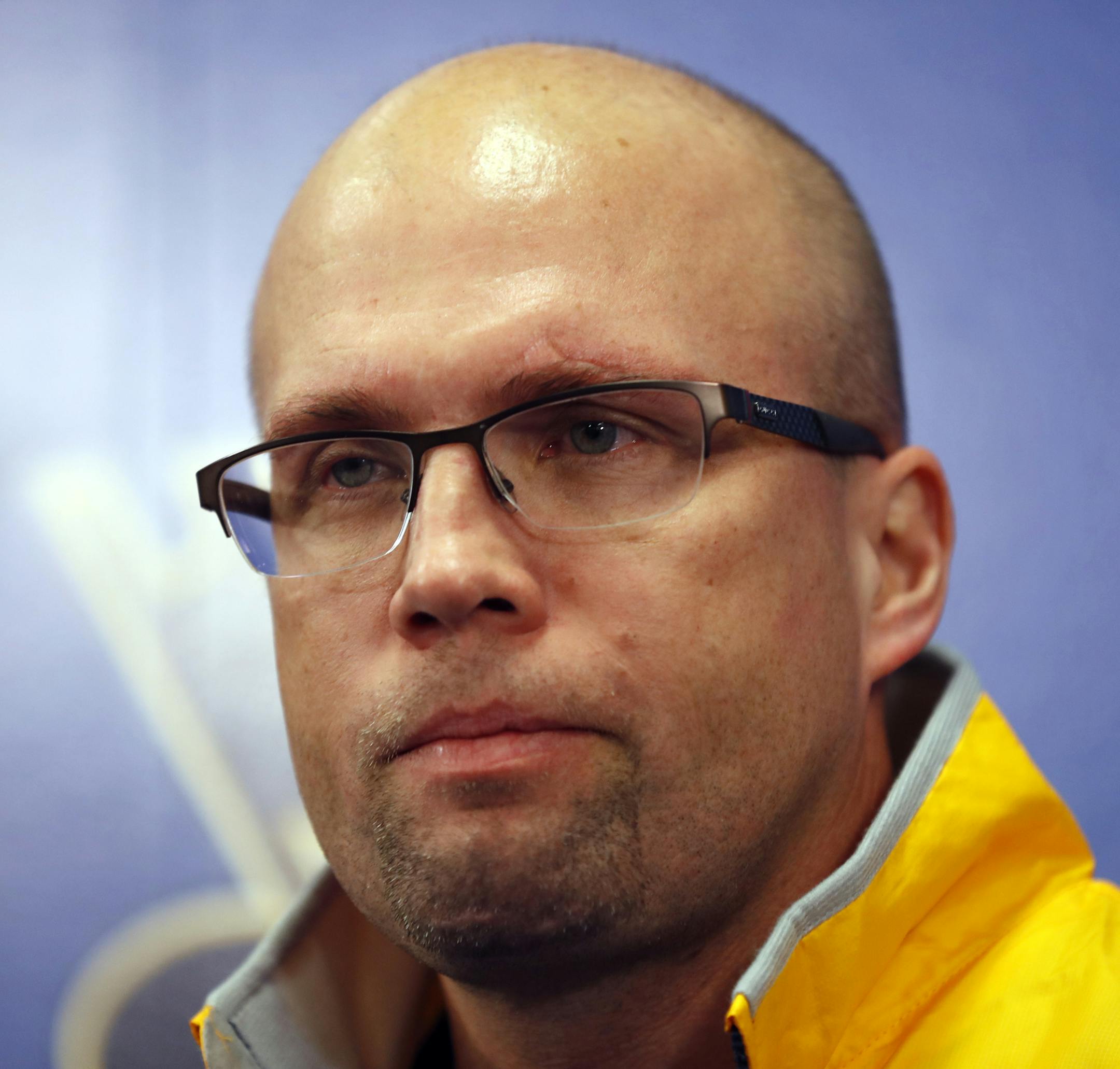 Mike Yeo listens to a question during a news conference after being naming the new head coach of the St. Louis Blues Wednesday, Feb. 1, 2017, in St. Louis. Yeo replaces Ken Hitchcock who was fired by the team. (AP Photo/Jeff Roberson) ORG XMIT: MOJR
