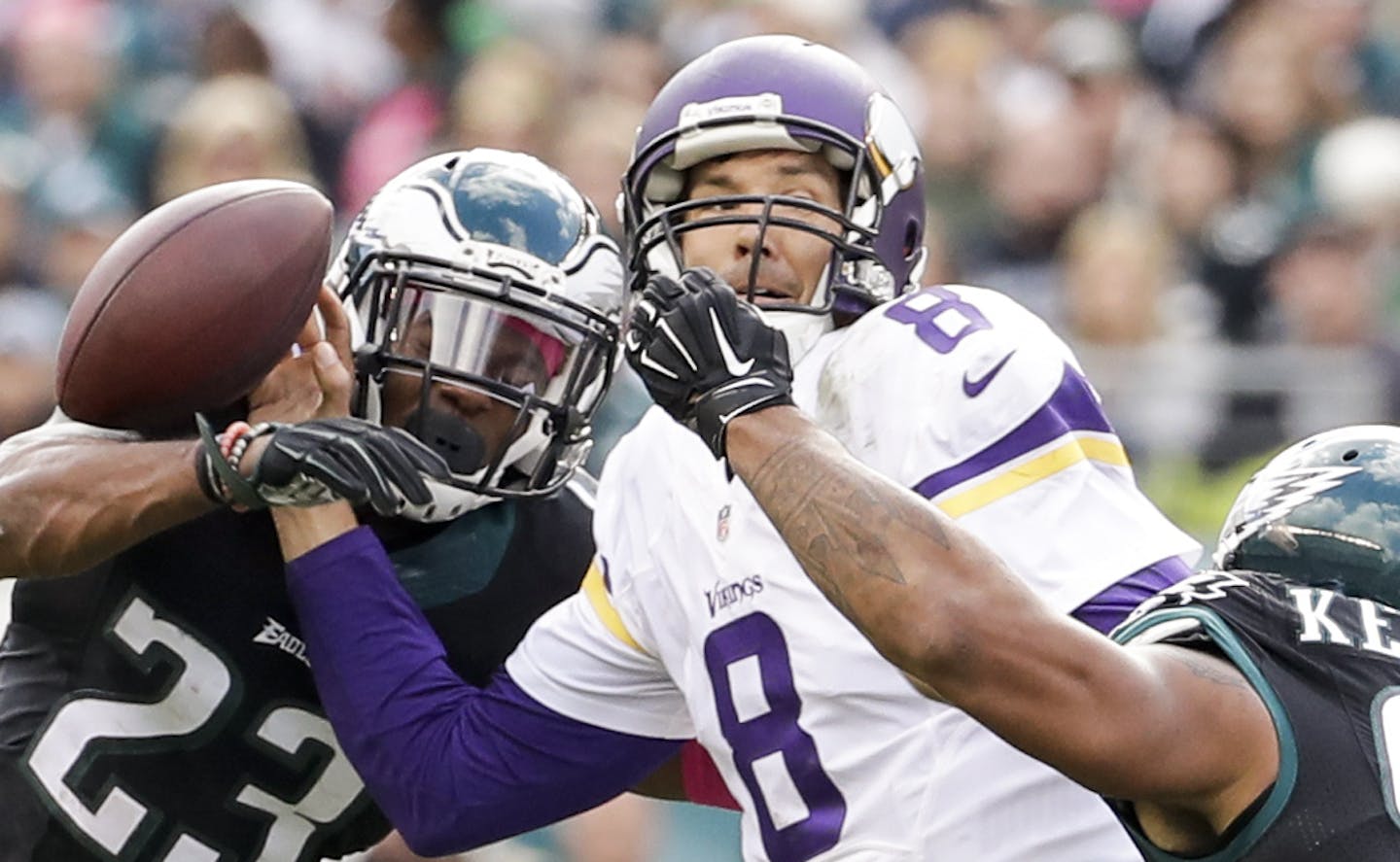 Minnesota Vikings quarterback Sam Bradford (8) under pressure by Philadelphia Eagles free safety Rodney McLeod (23) and outside linebacker Mychal Kendricks (95) during the NFL football game, Sunday, Oct. 23, 2016, in Philadelphia. The Eagles won 21-10. (AP Photo/Chris Szagola) ORG XMIT: OTKCS236