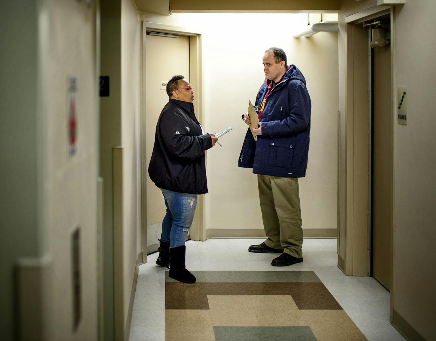 Andrew Vieden and Artiste Mayfield knocked on doors in a North Minneapolis apartment building asking if residents had any concerns or issues that they could pass along to U.S. Rep. Keith Ellison. They heard about his stand on the 4th district protests, nonprofit agencies that don't deliver on their promises and traffic problems. ] GLEN STUBBE * gstubbe@startribune.com Friday, December 11, 2015 Keith Ellison says he can change the way American politics looks by just getting more people out to vot